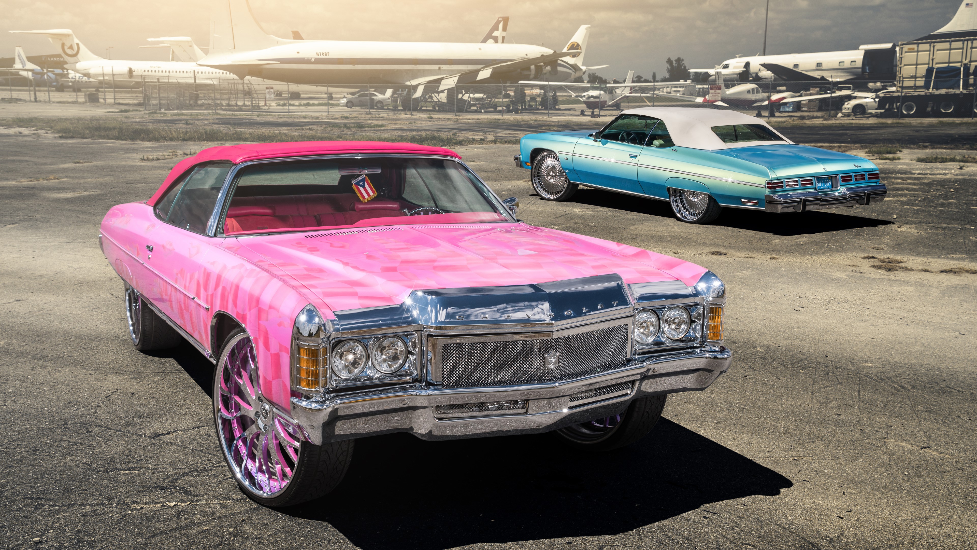 Pink and Blue Classic Chevrolet Lowriders at Airport HD Wallpaper