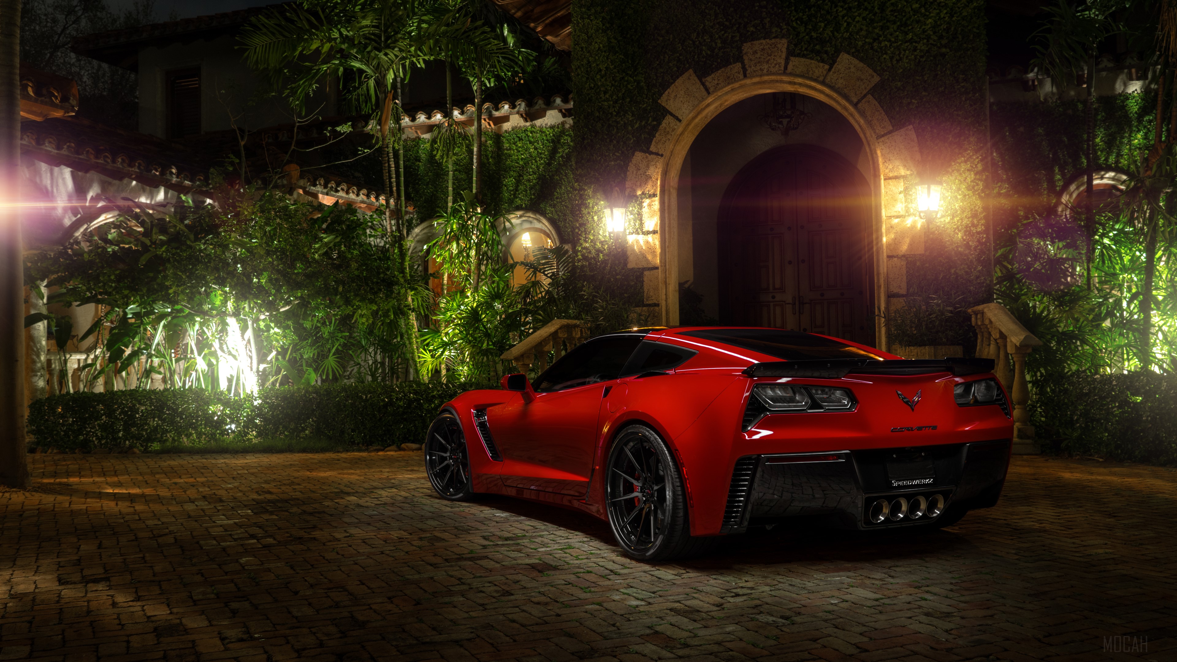 Red Chevrolet Corvette parked in front of a mansion HD Wallpaper
