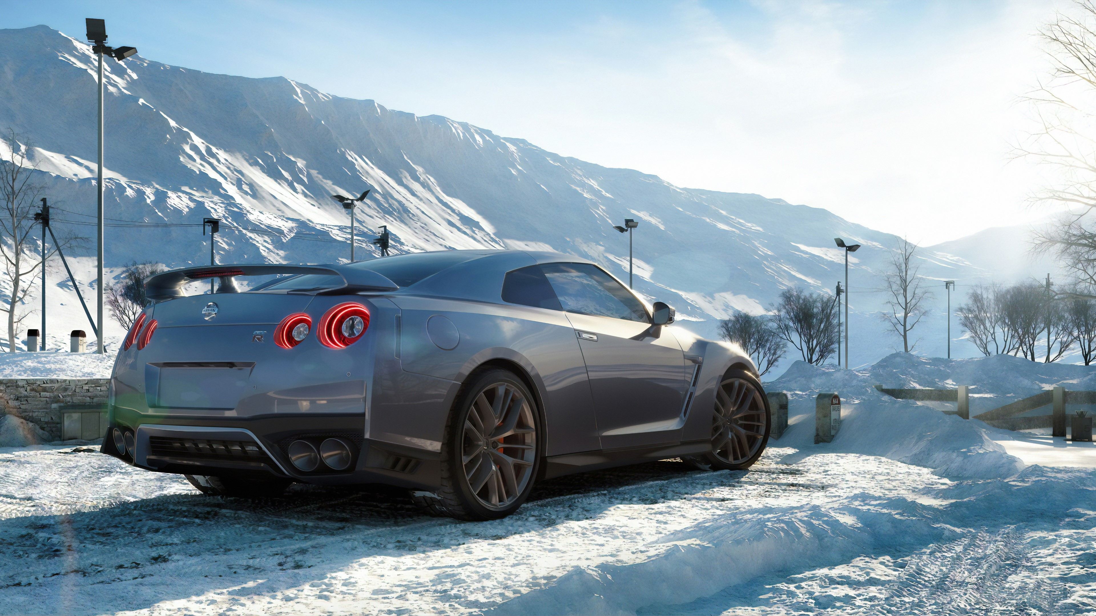 Nissan GTR in a Snowy Mountain Landscape 4K HD Wallpaper