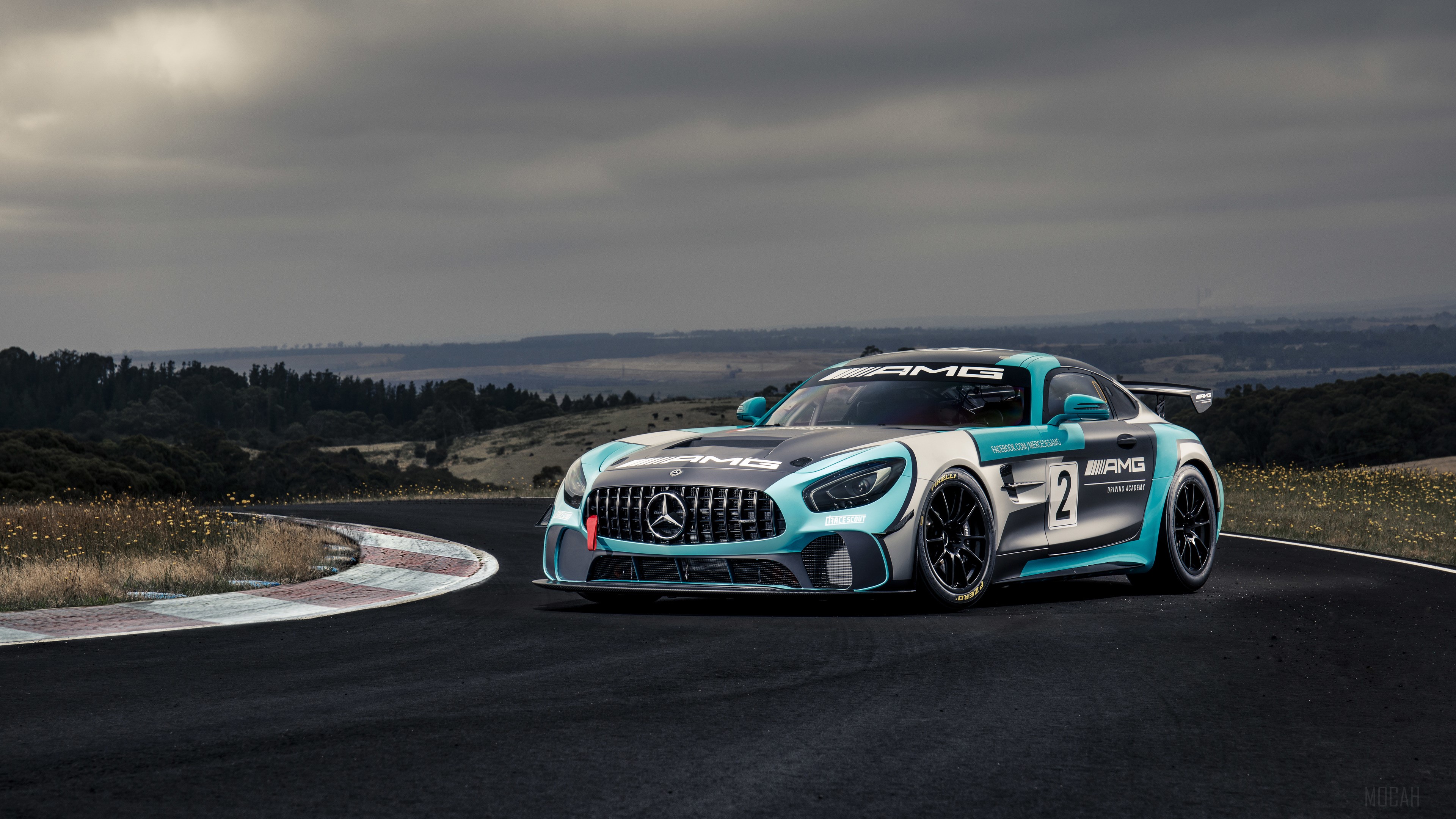Mercedes AMG GT4 race car on track 4K HD Wallpaper