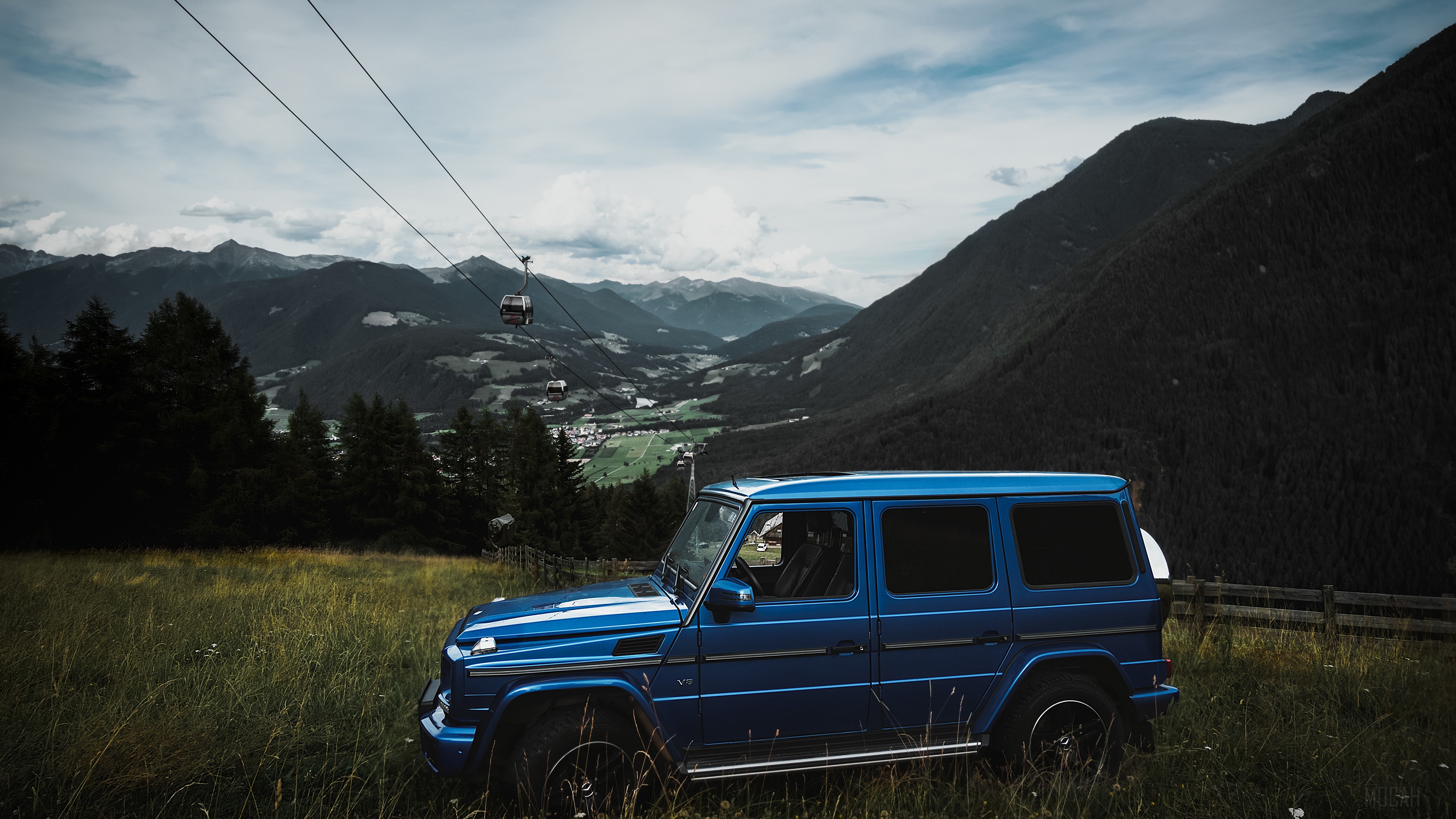Blue Mercedes Benz G Class in Mountains with Cable Cars HD Wallpaper