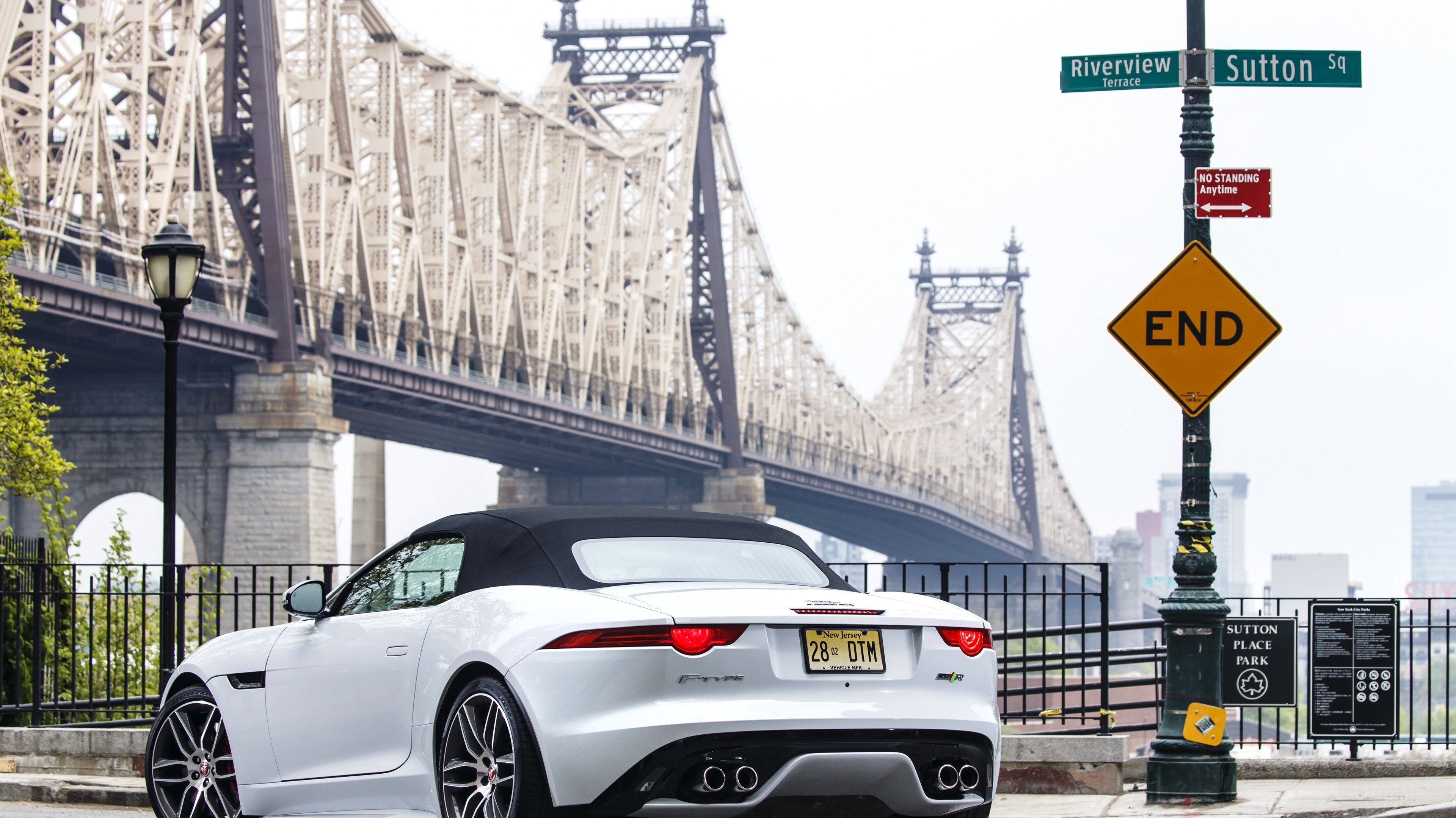 White Jaguar F Type Convertible in New York City HD Wallpaper