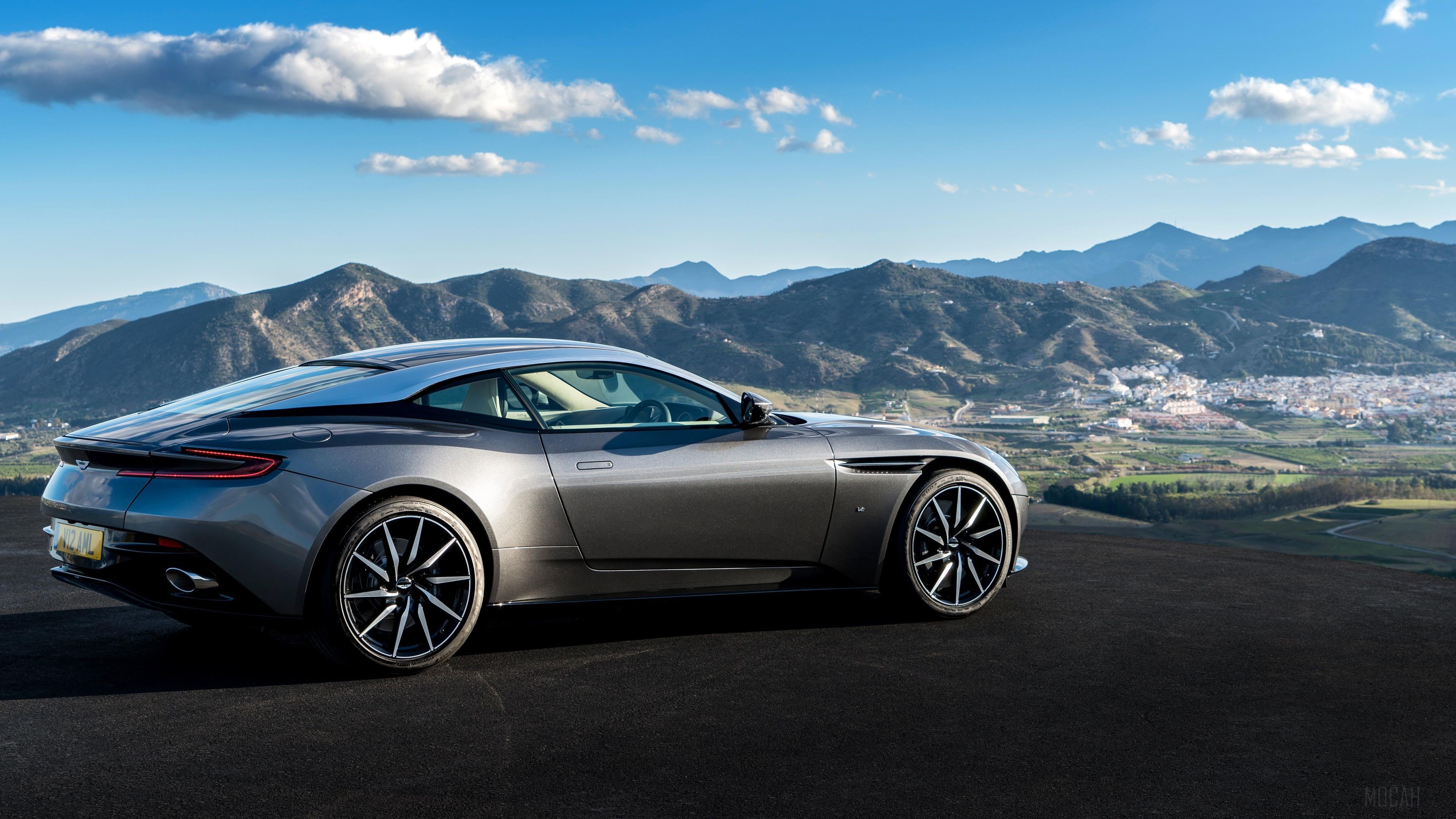 Aston Martin DB11 in front of mountains HD Wallpaper