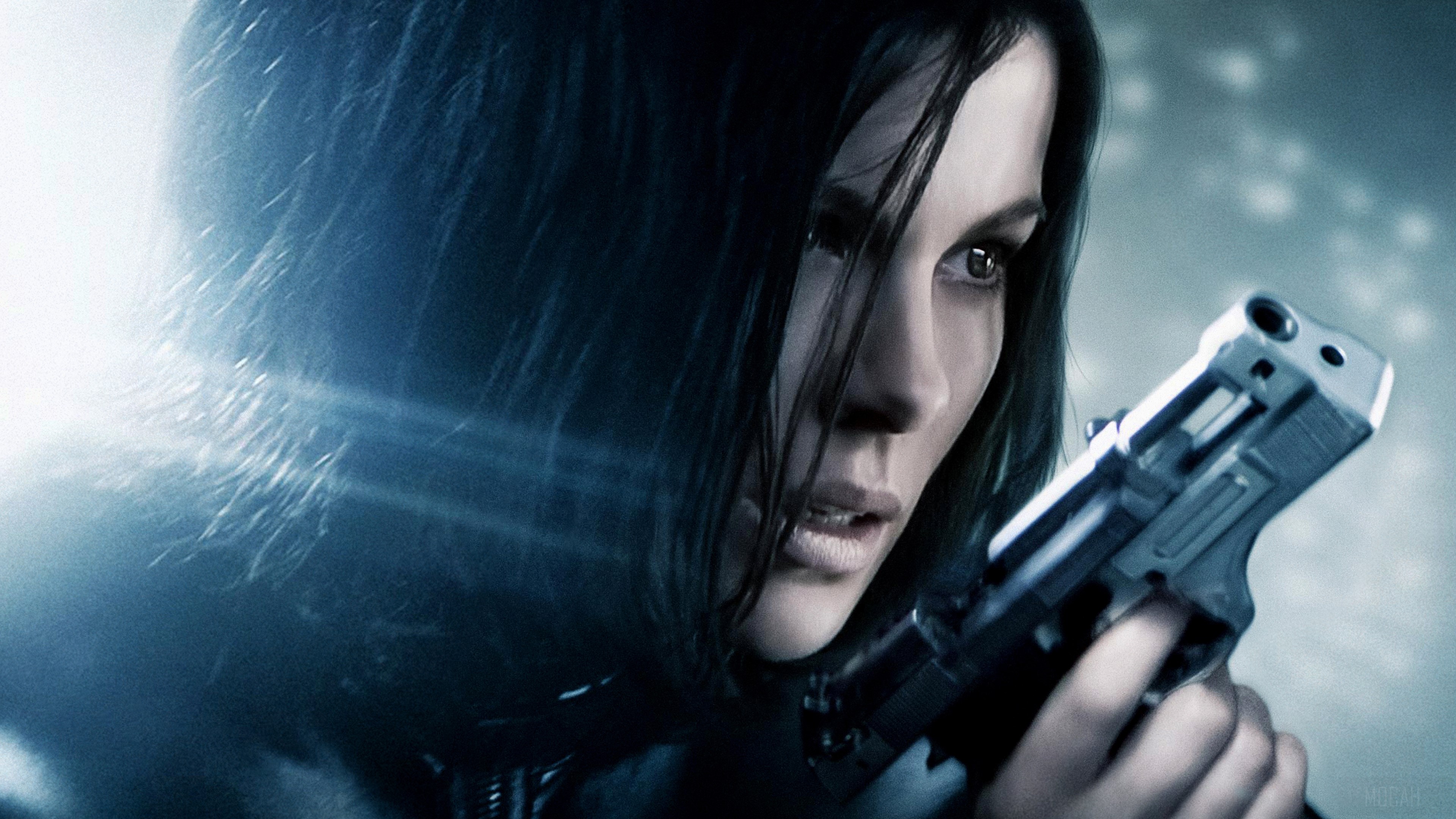 Selene from Underworld holding a gun HD Wallpaper