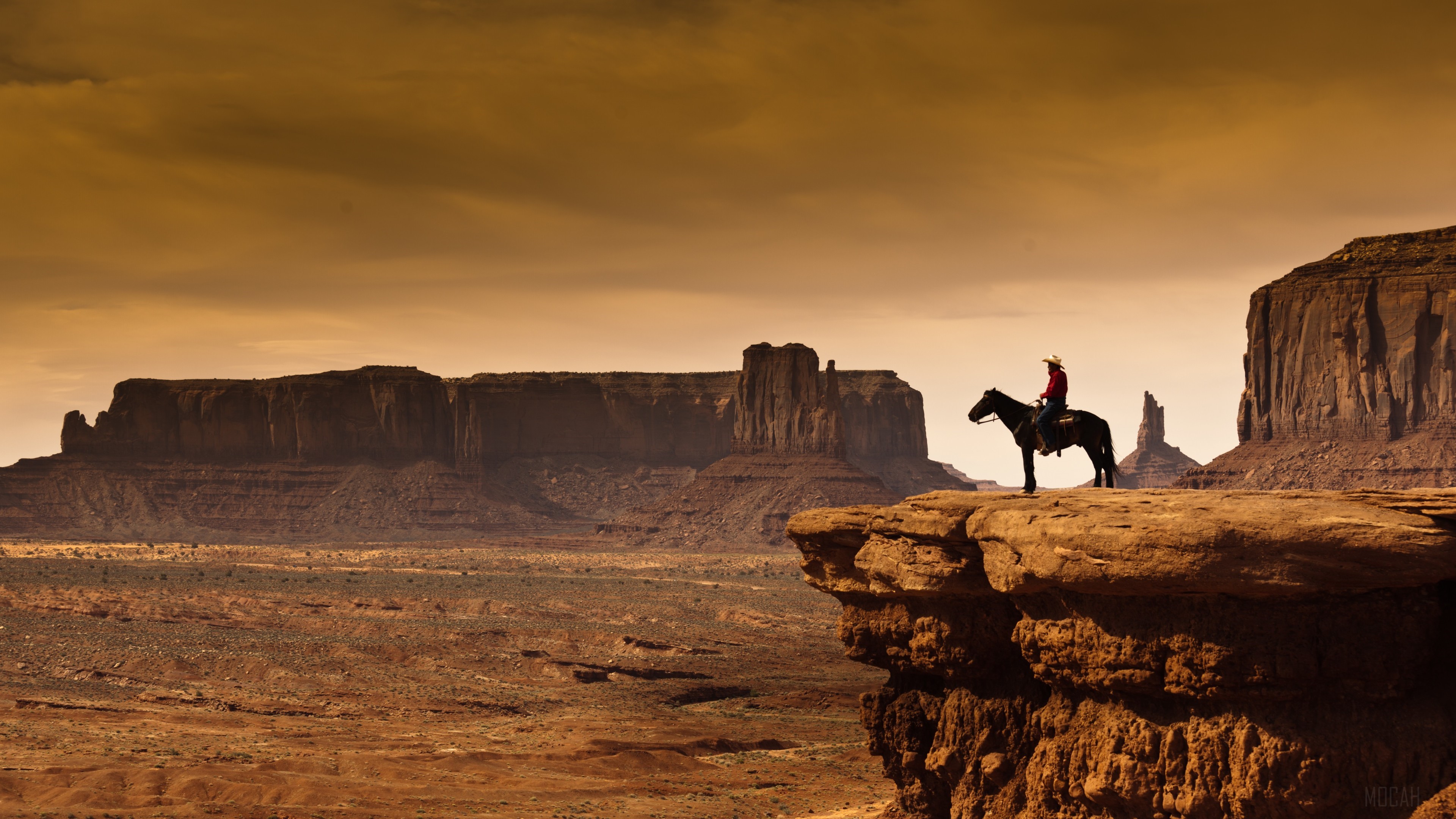 Cowboy on horseback overlooking Monument Valley 4K HD Wallpaper