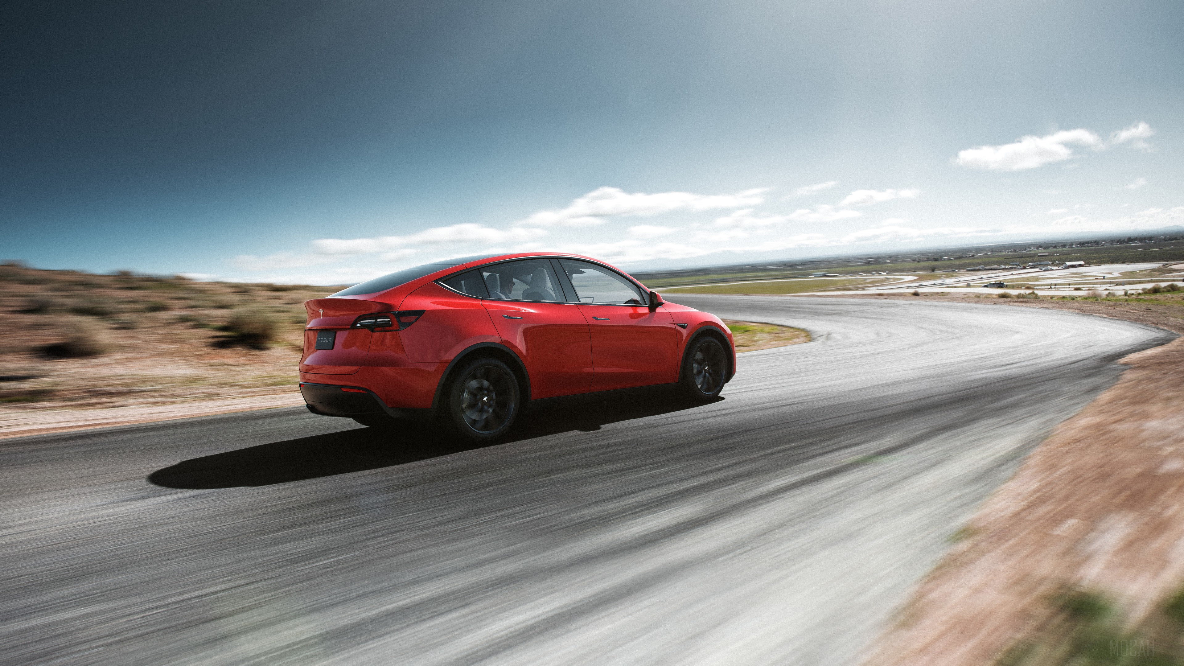 Red 2019 Tesla Model Y on a Racetrack HD Wallpaper