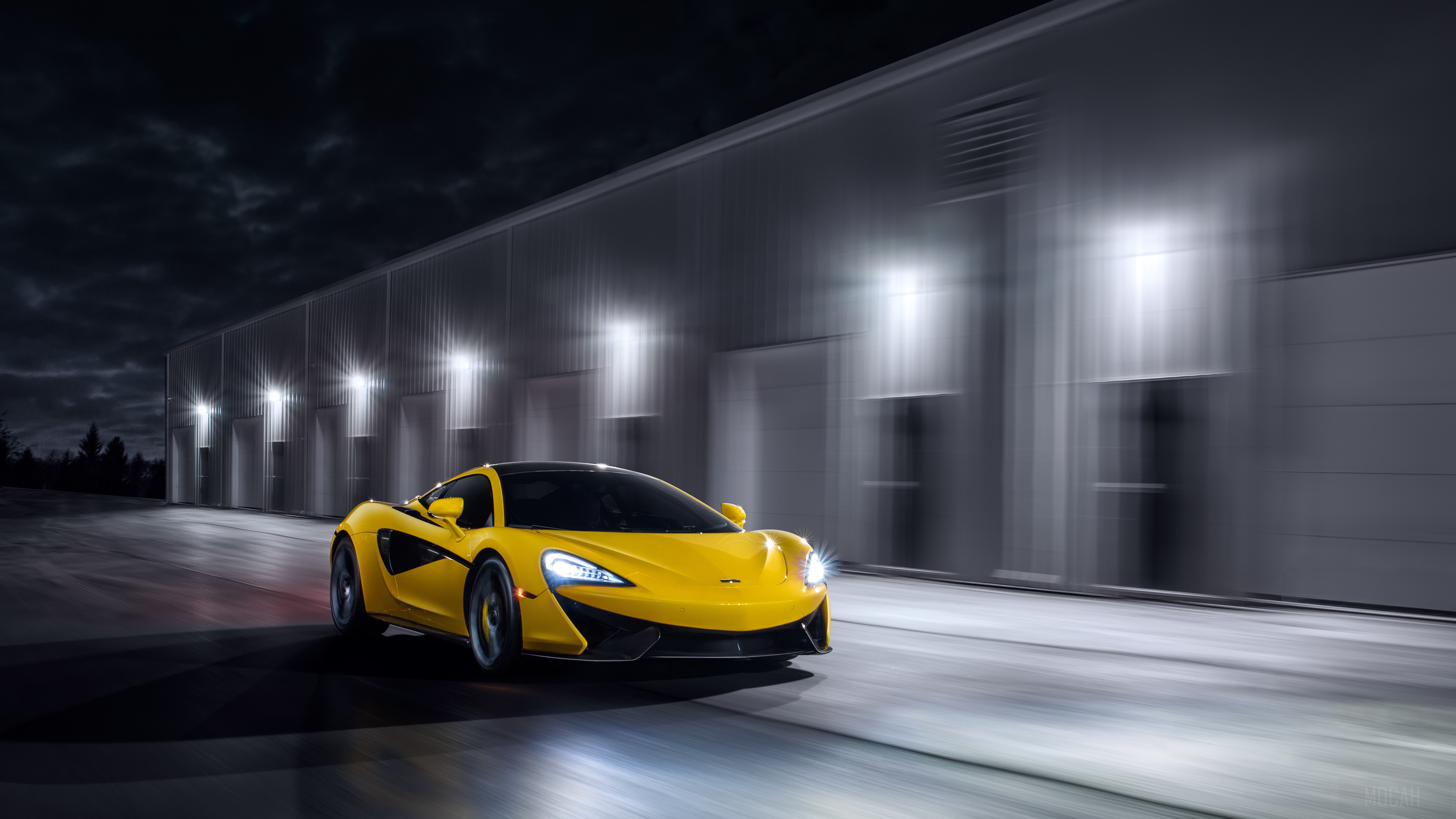 Yellow McLaren 570S driving at night HD Wallpaper
