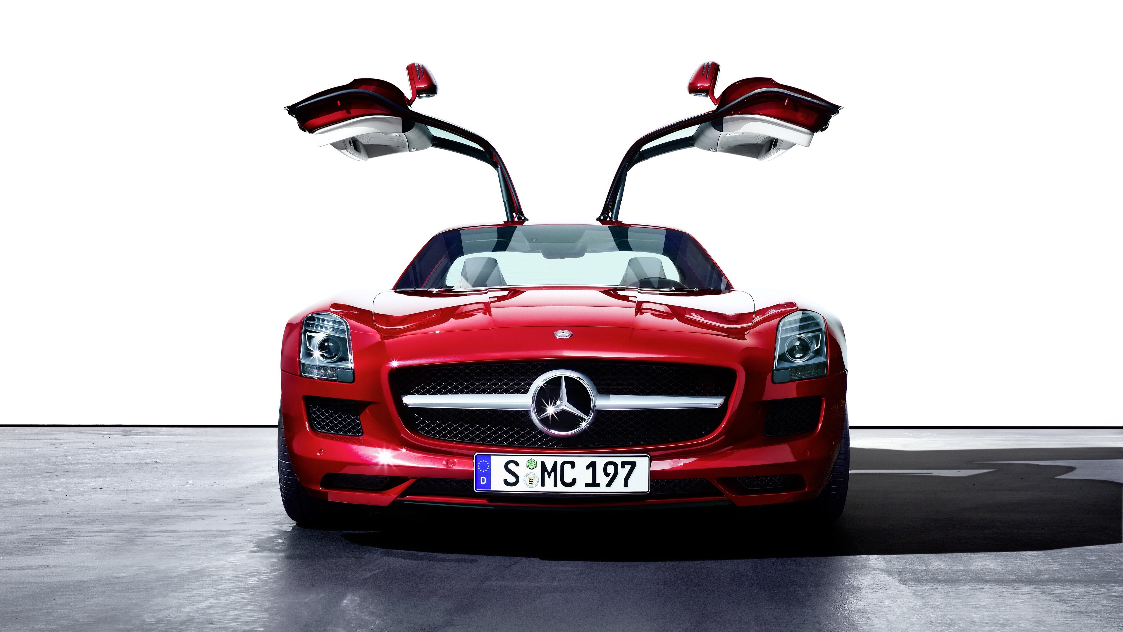 Red Mercedes Benz SLS AMG with Gullwing Doors HD Wallpaper