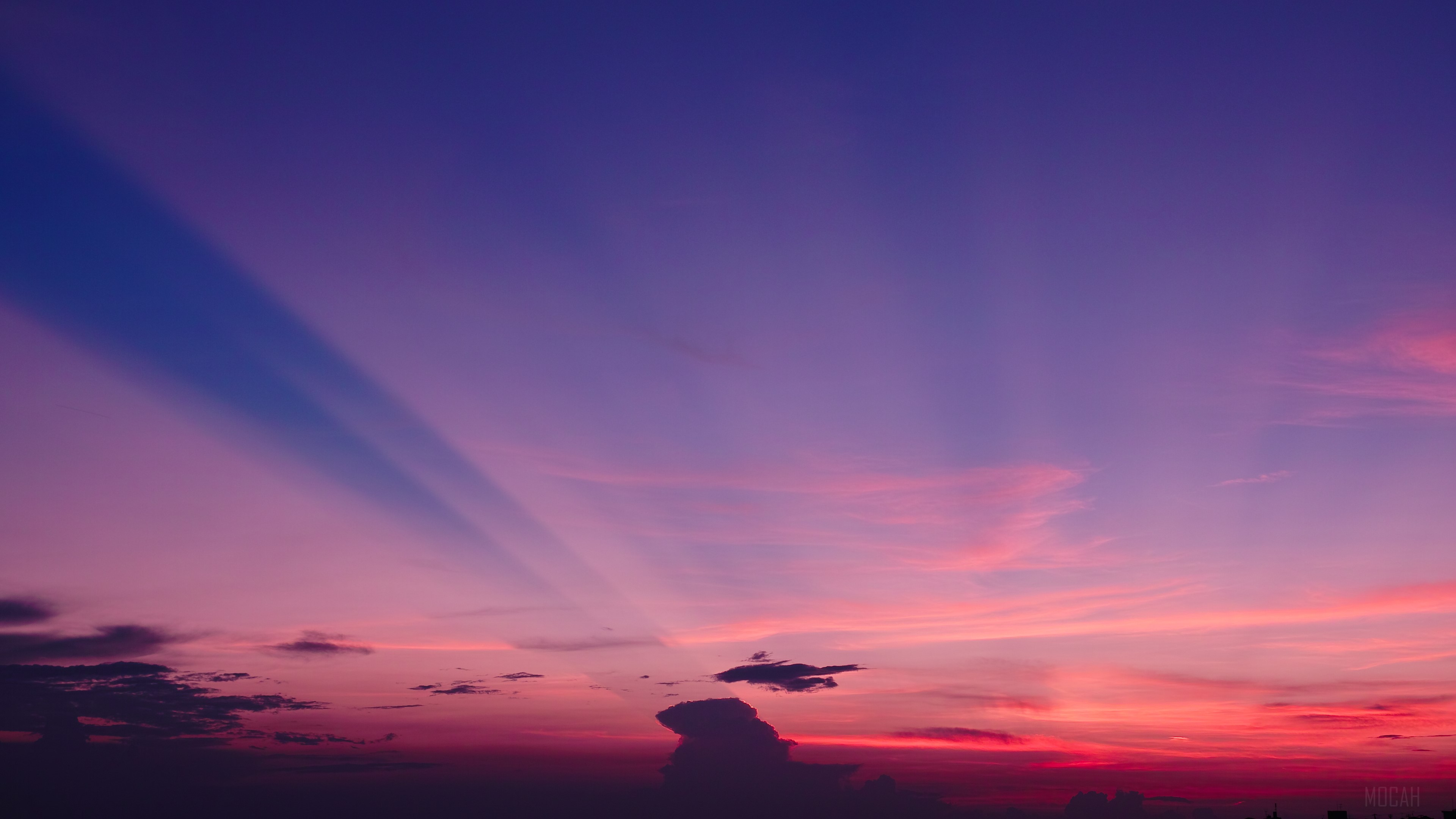 Purple Sky with Sun Rays Over City 4K HD Wallpaper