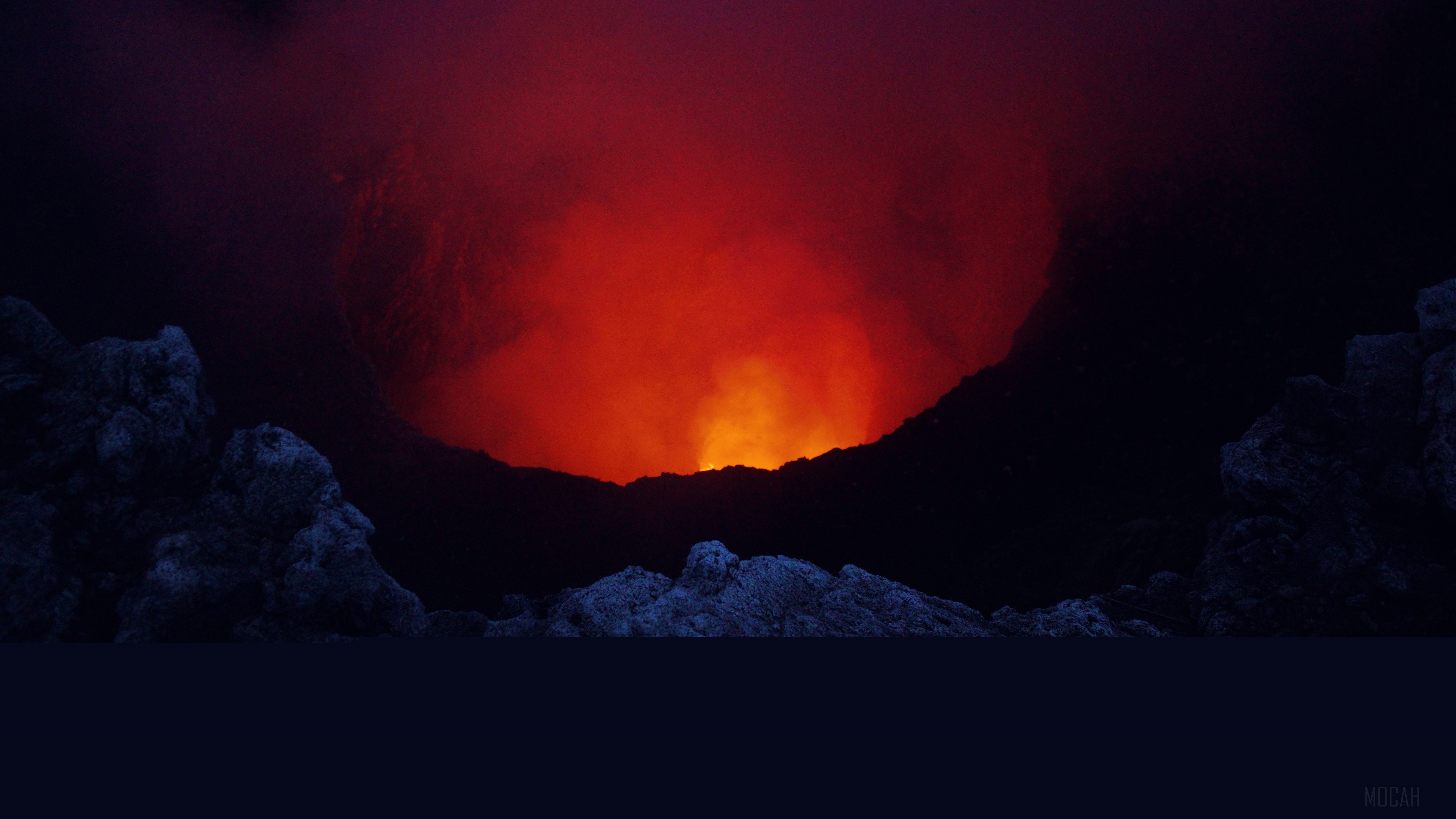 Volcano crater with red lava and smoke 4K HD Wallpaper