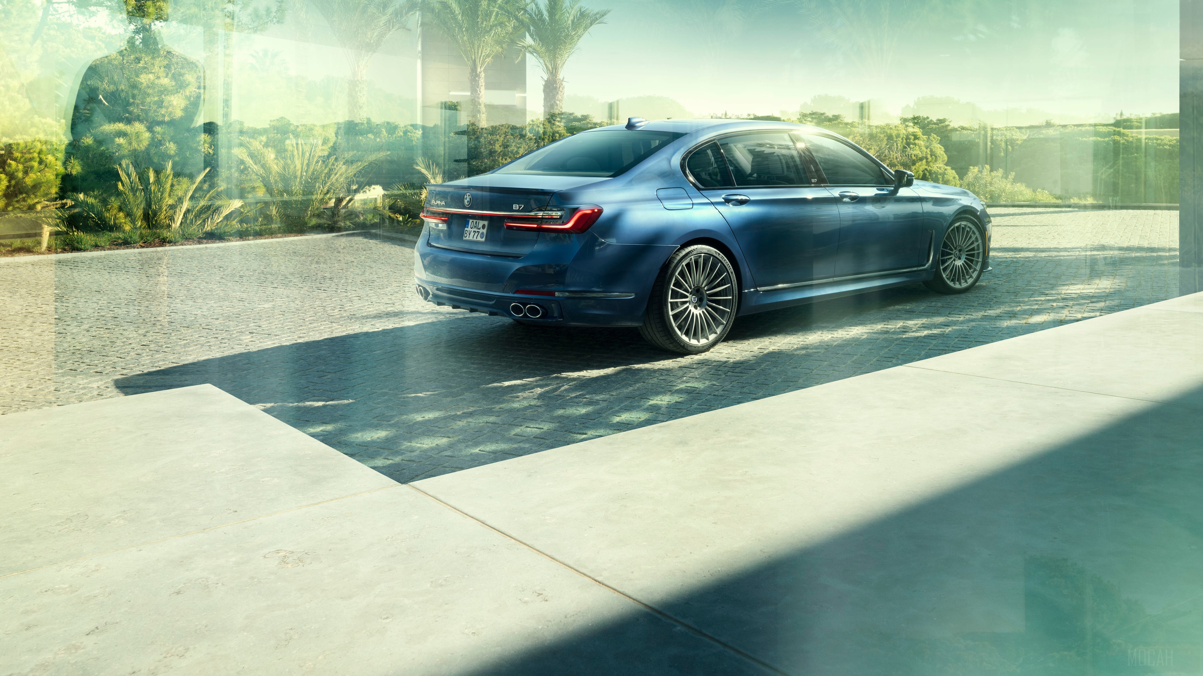 Blue Alpina B7 parked near a modern building HD Wallpaper