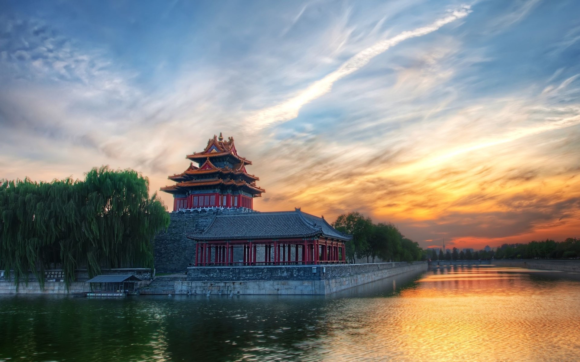 Watchtower by the water at sunset HD Wallpaper