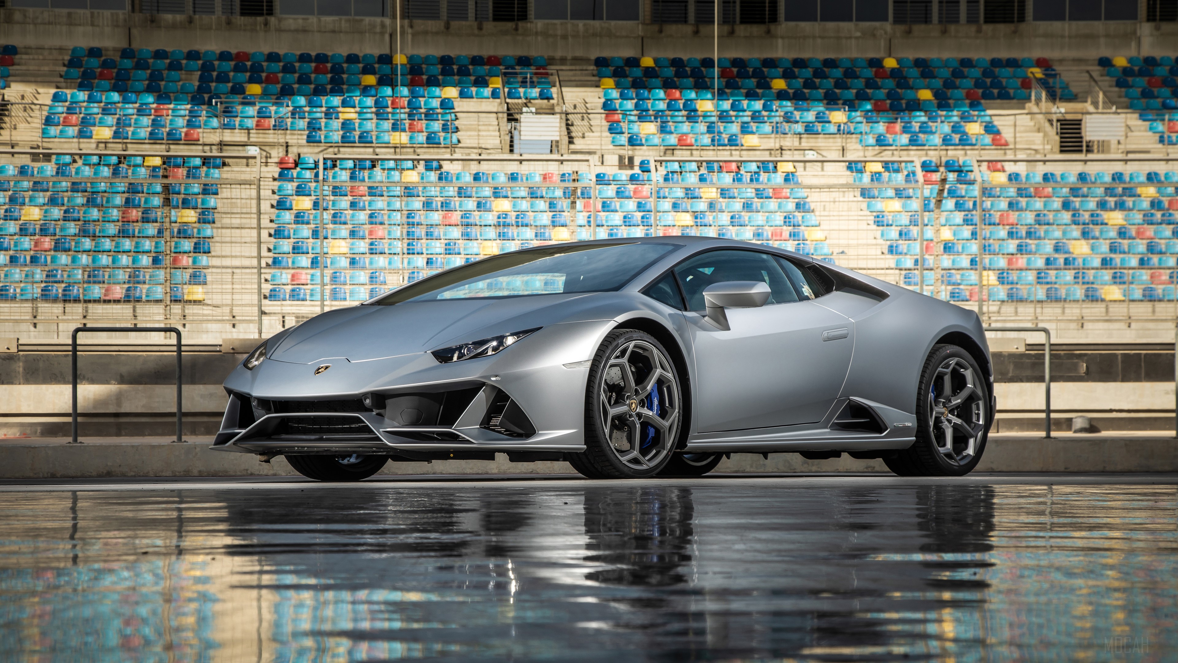 Silver Lamborghini Huracan Evo on wet track HD Wallpaper