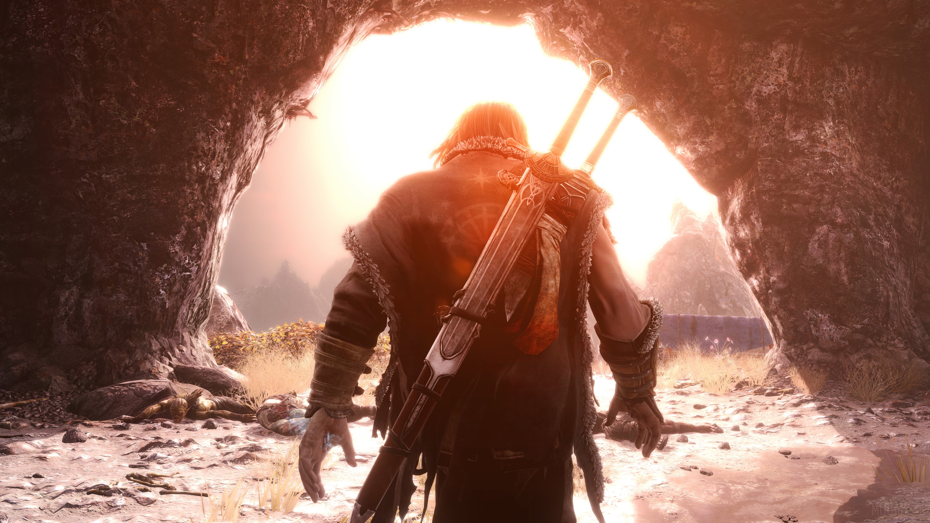 Man with sword emerging from cave in Shadow of Mordor 4K HD Wallpaper