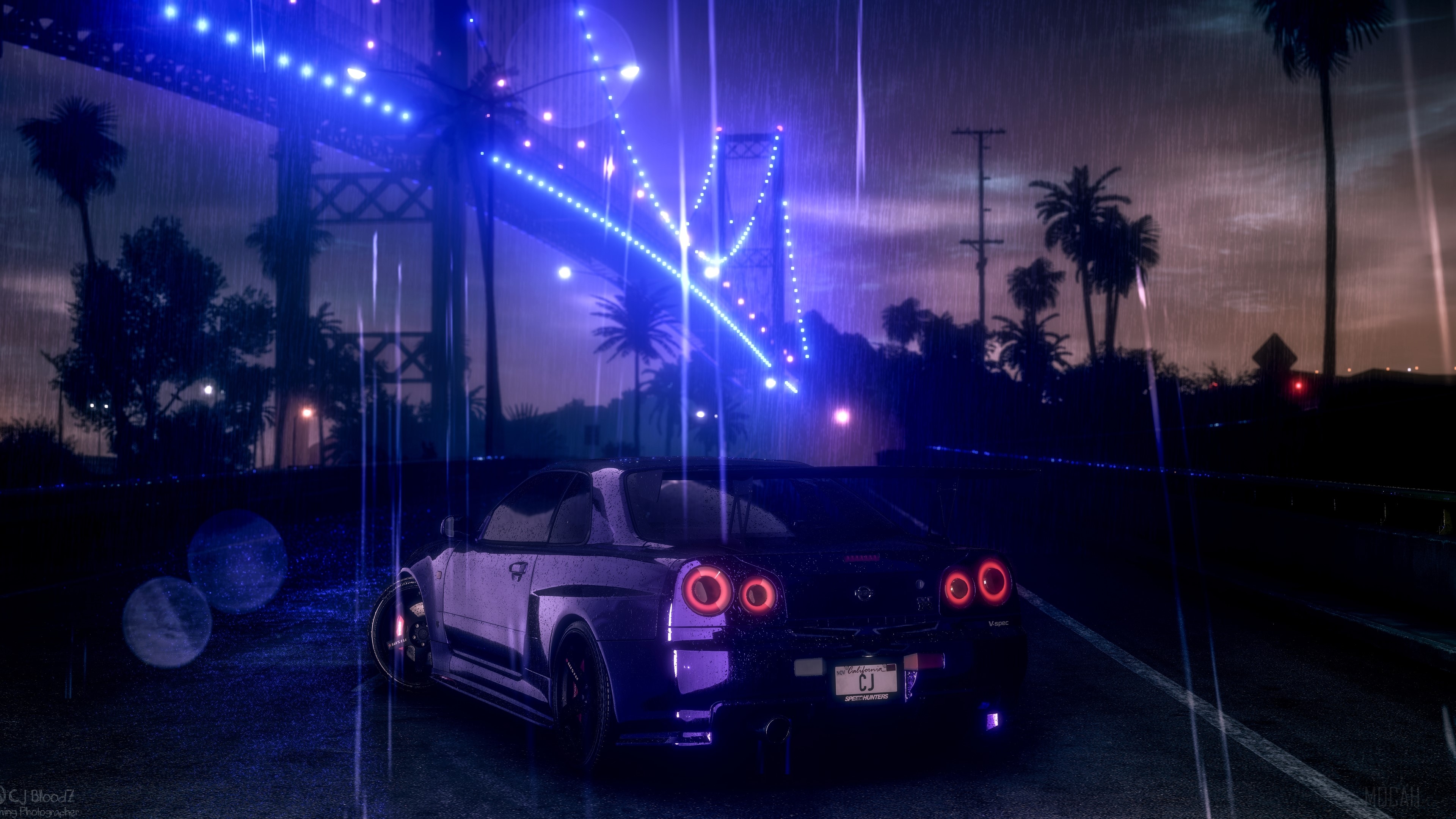 Nissan Skyline GT-R R34 on a bridge at night in the rain HD Wallpaper