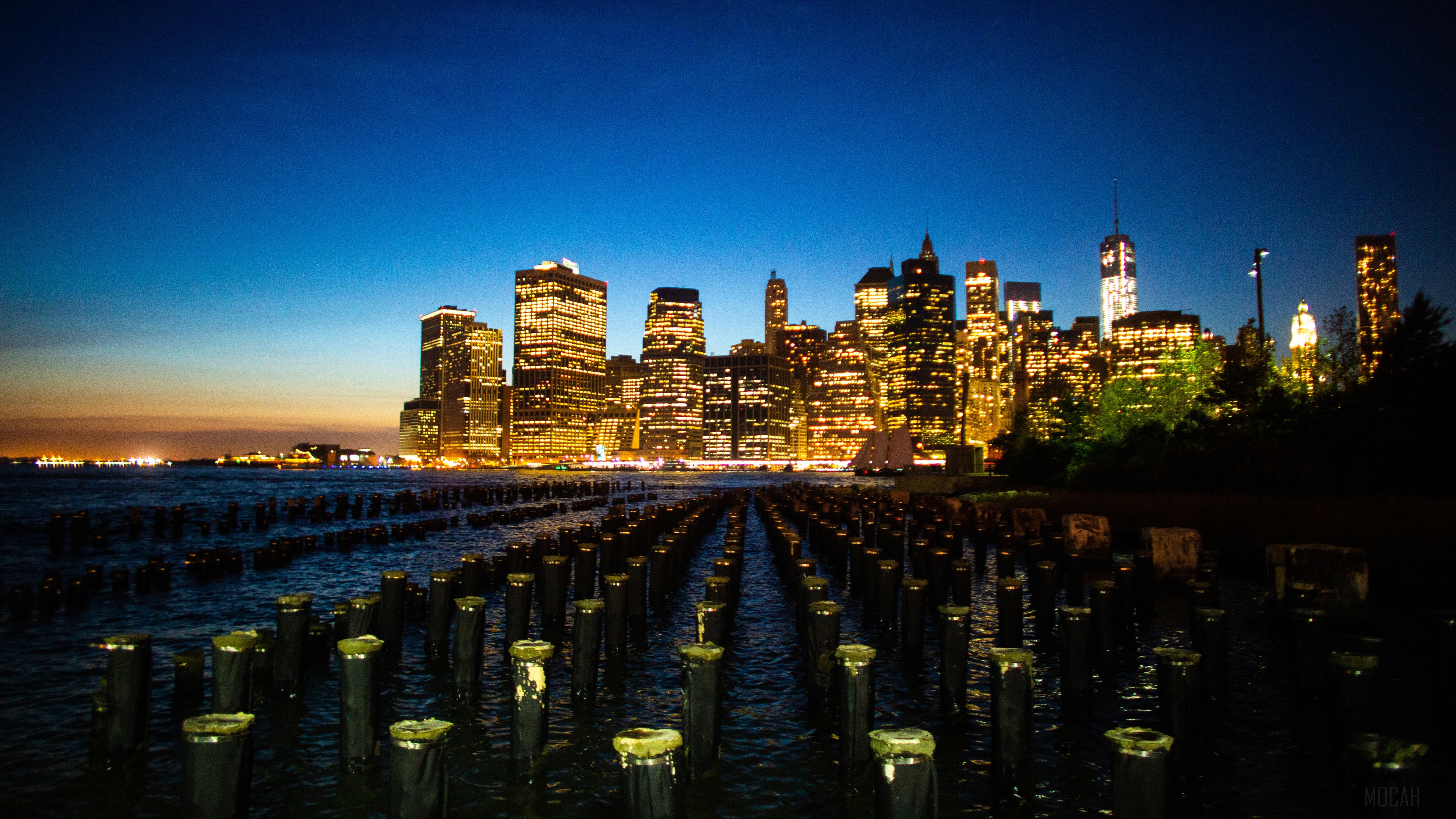 New York City Skyline at Dusk with Pier Pilings HD Wallpaper