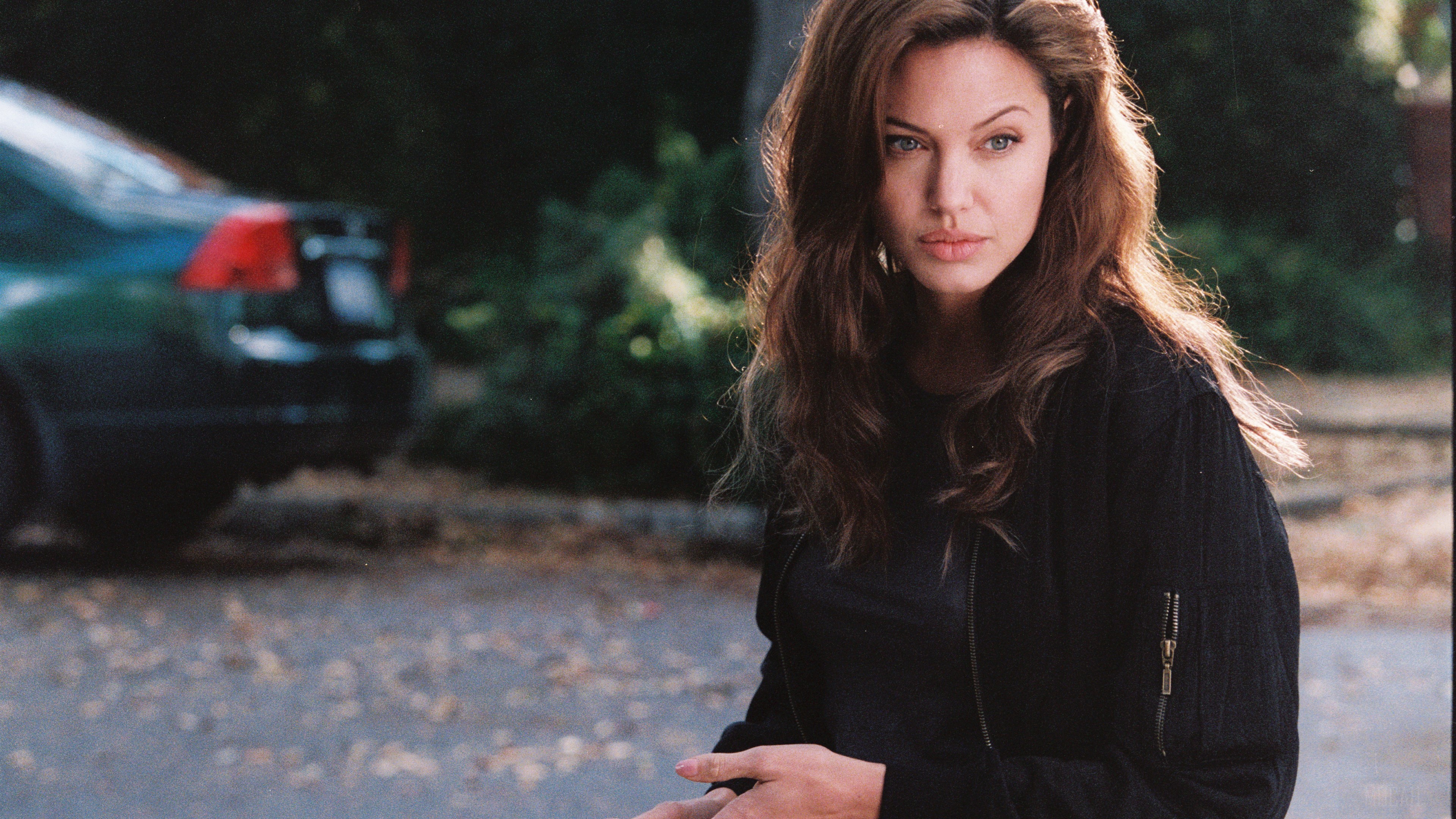 Angelina Jolie in black jacket HD Wallpaper
