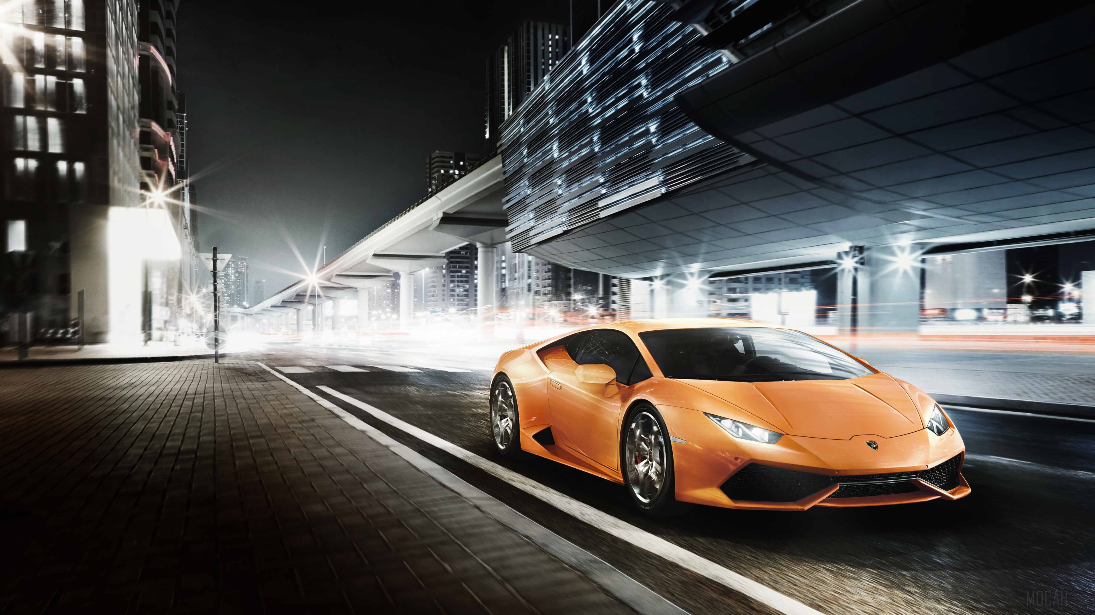 Orange Lamborghini Huracan driving at night HD Wallpaper