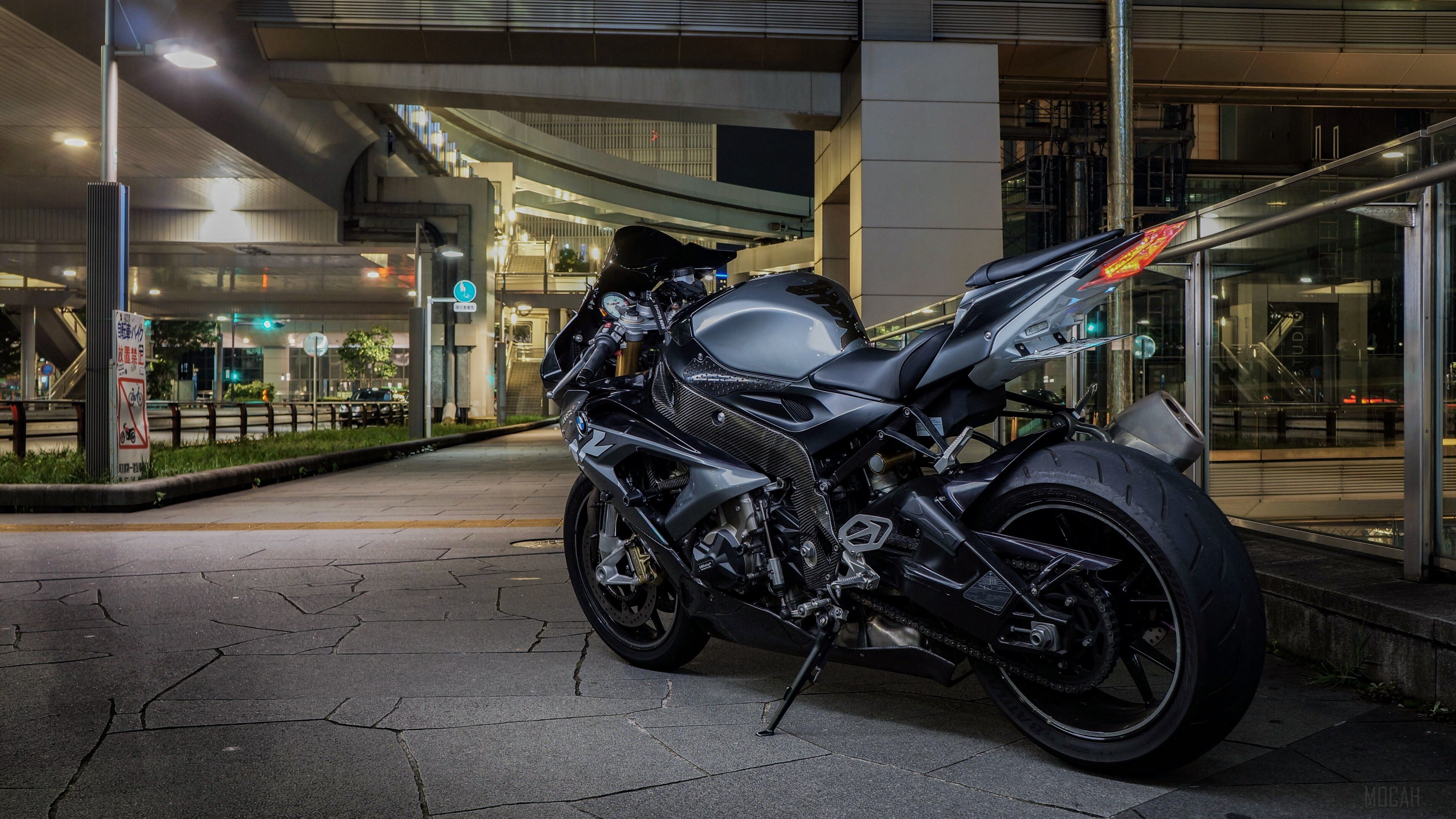 BMW S1000RR motorcycle parked at night HD Wallpaper