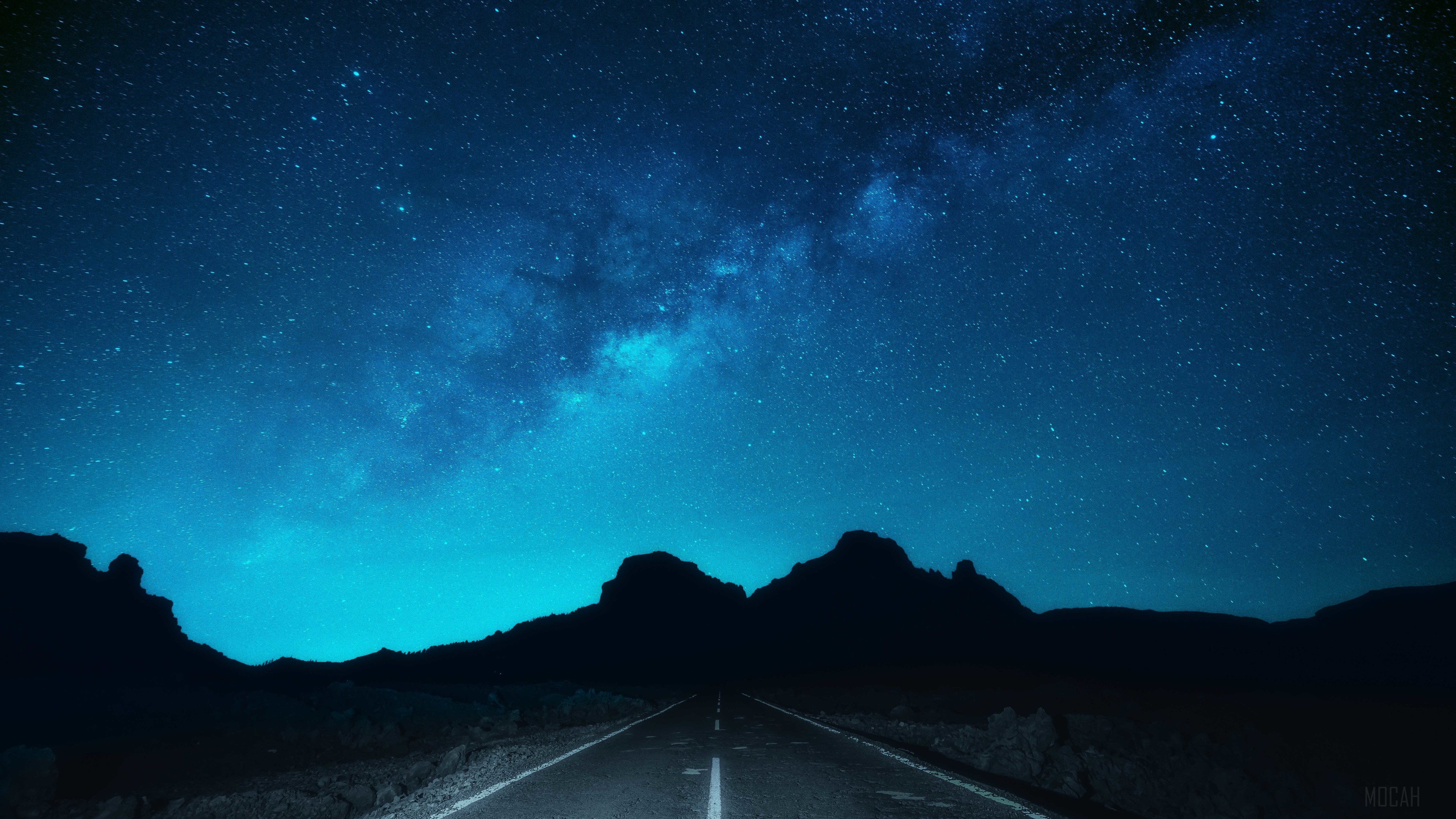 Milky Way over a desert road HD Wallpaper