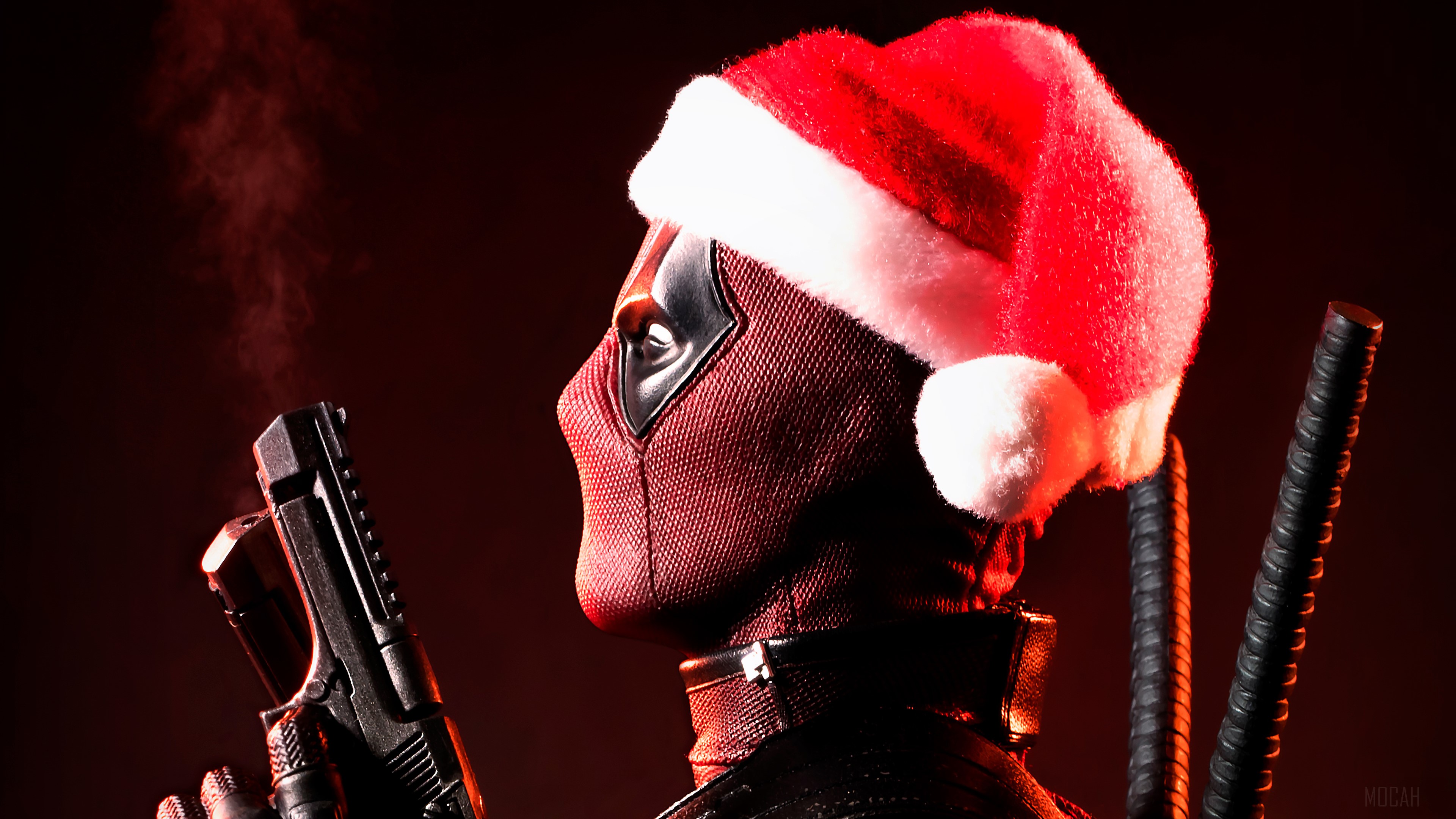 Deadpool wearing a Santa hat with a gun HD Wallpaper