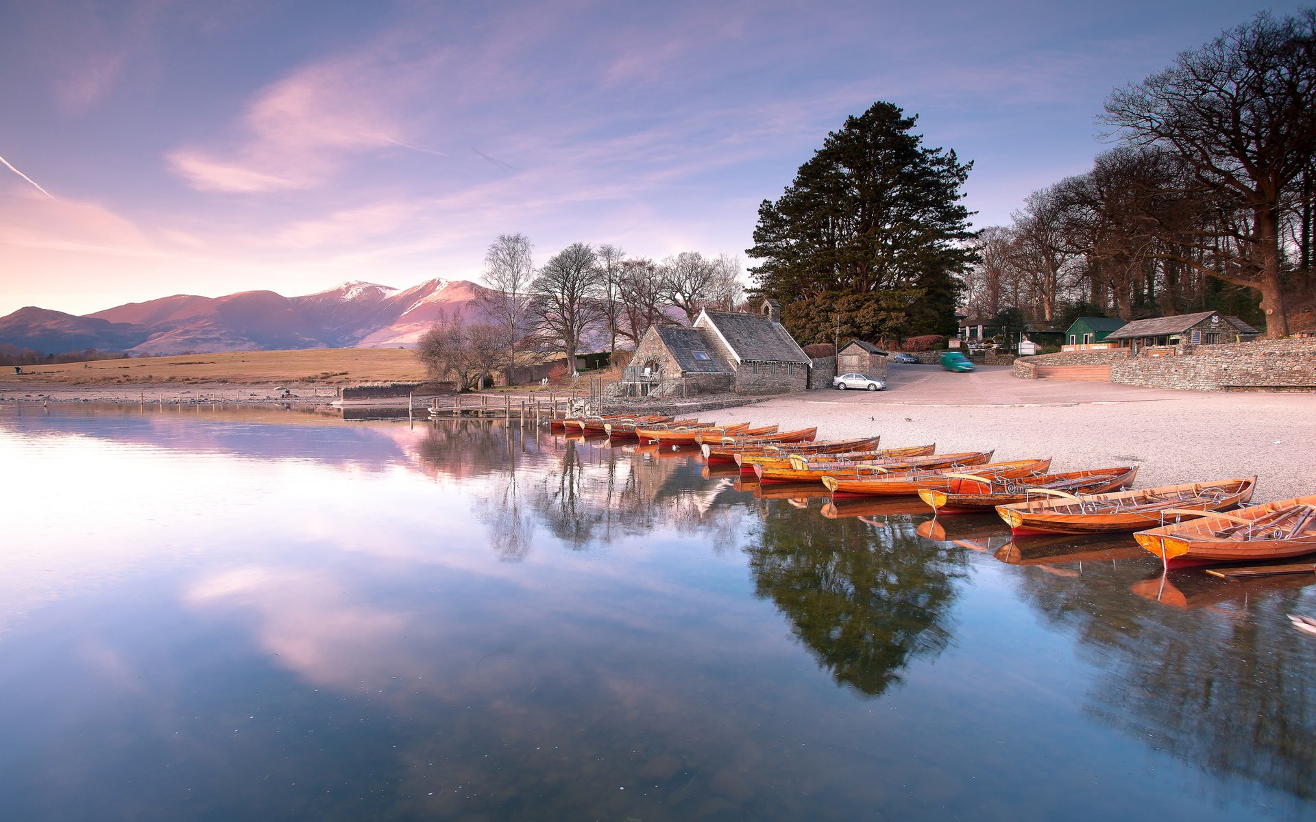 Boats on a lake with mountains in the background HD Wallpaper