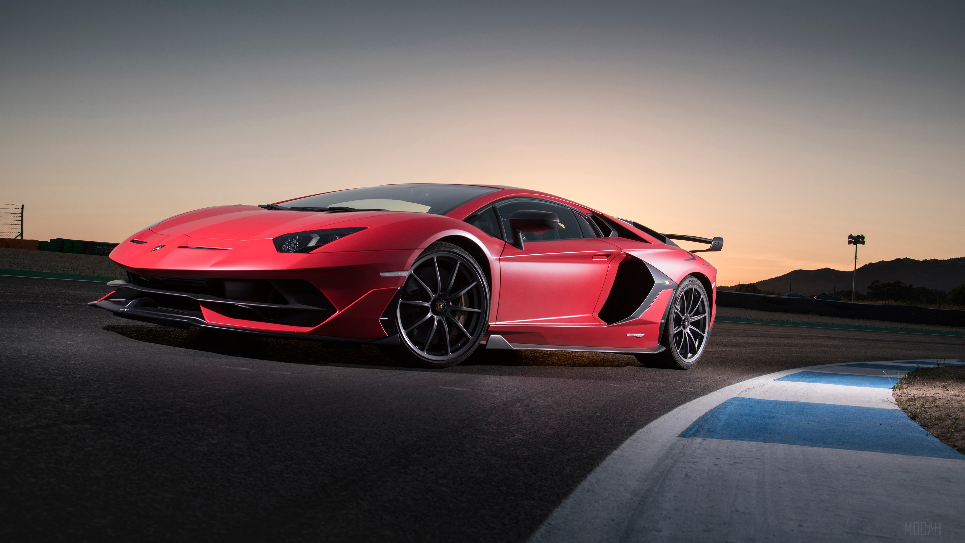 Red Lamborghini Aventador SVJ 2018 on a Racetrack 4K HD Wallpaper