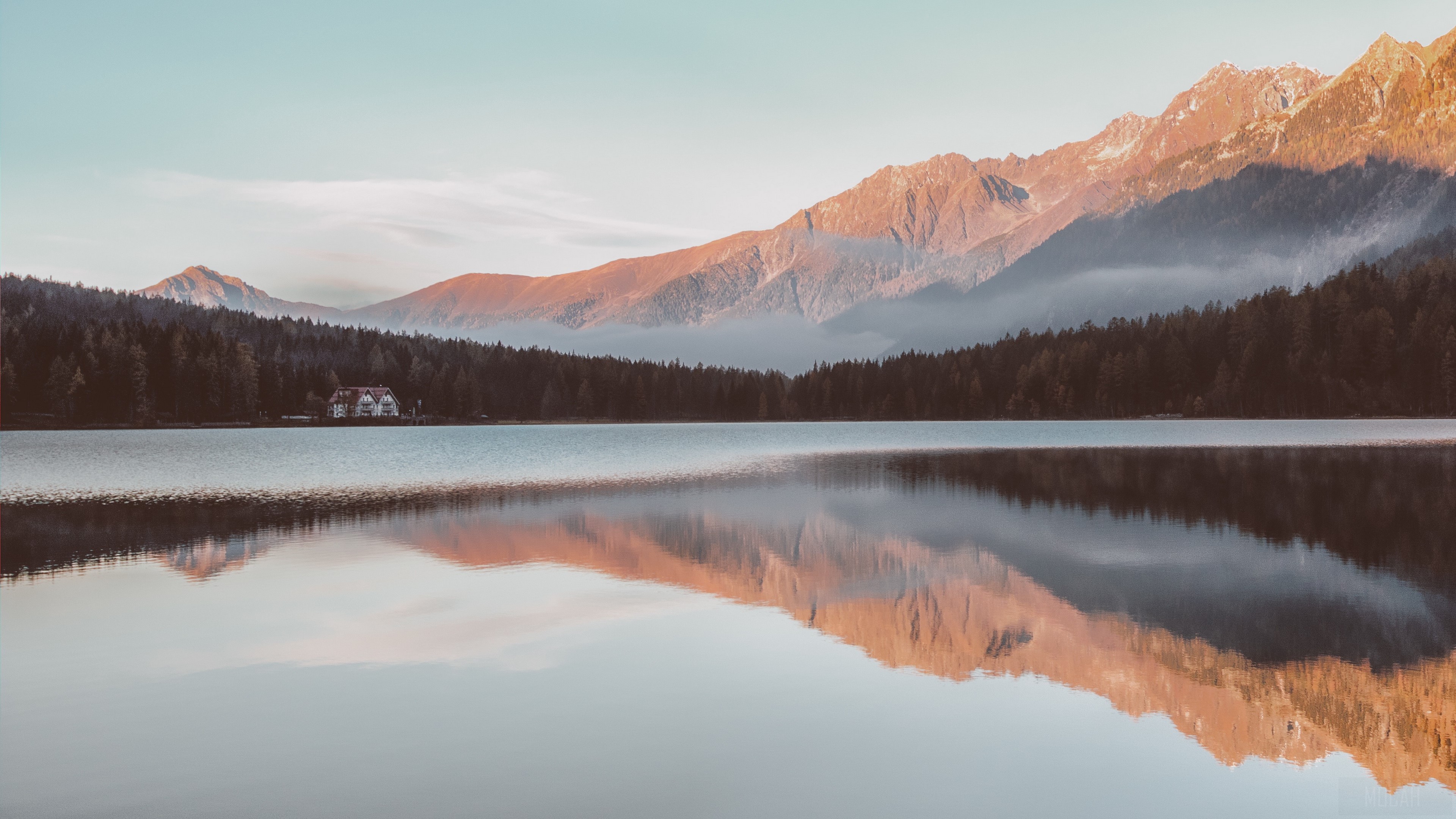Lake reflection of mountains and house 4K HD Wallpaper
