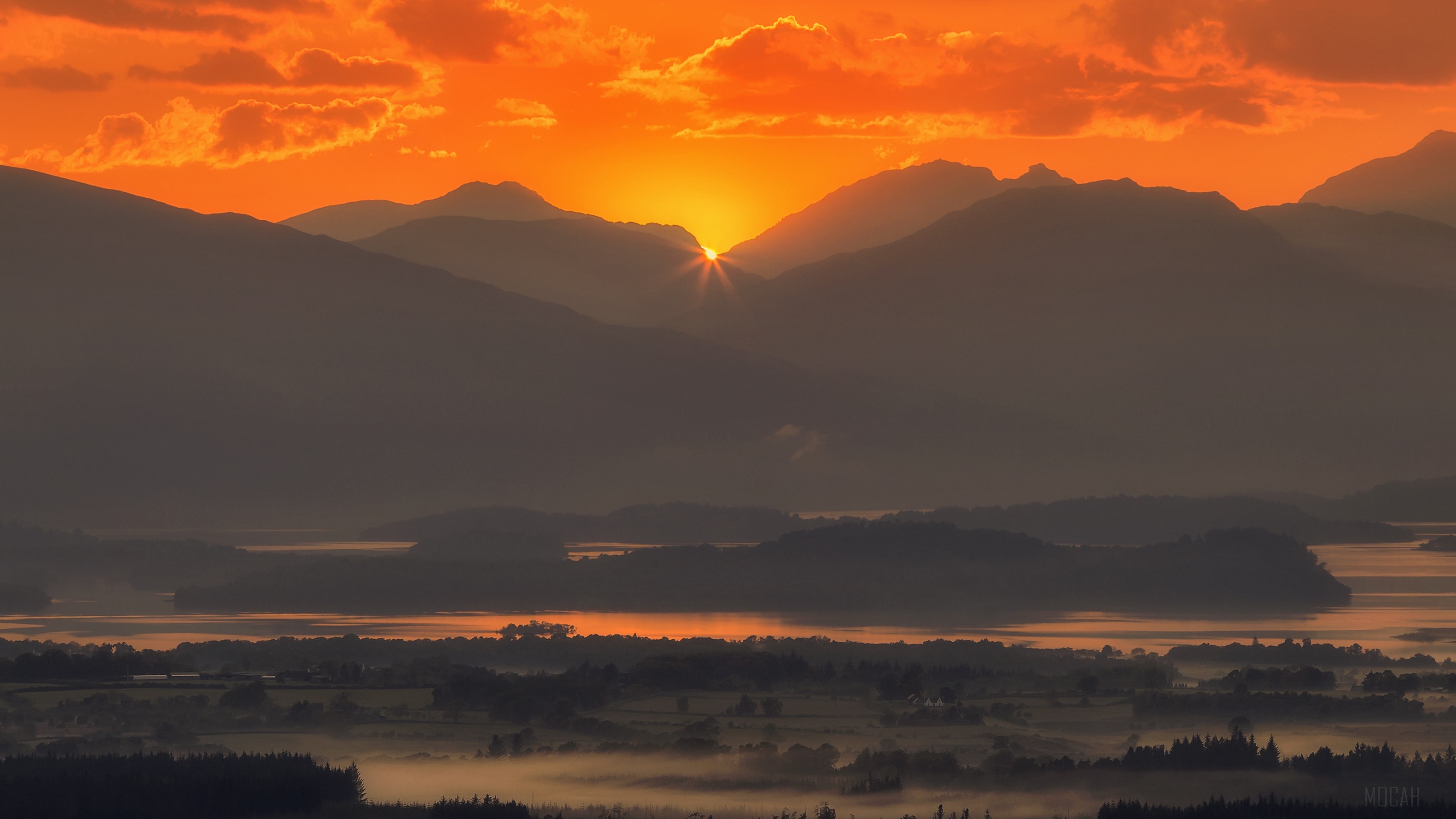 Sunset over mountains with fog in Scotland 4K HD Wallpaper