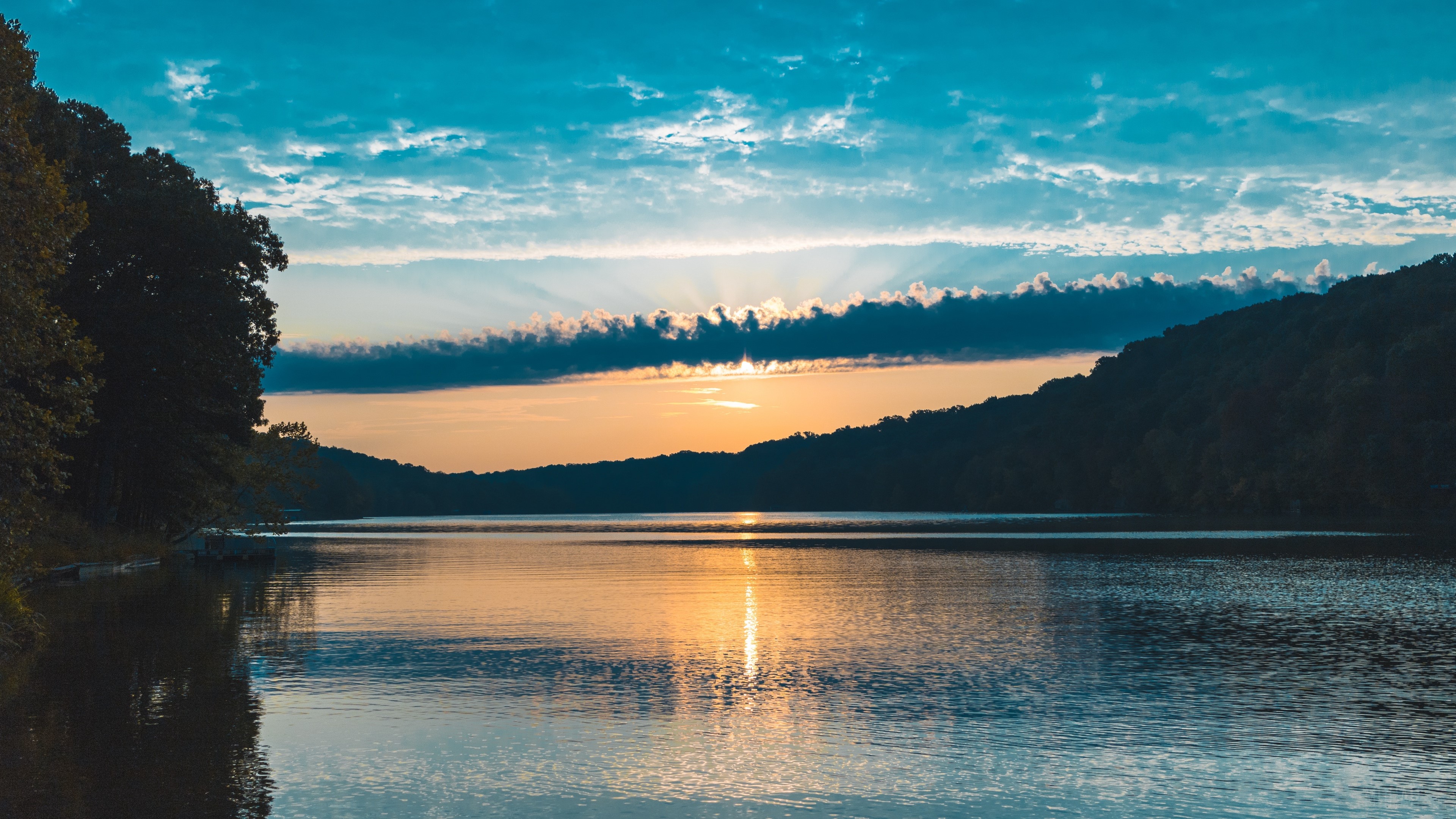 Sunset over a lake with trees and clouds 4K HD Wallpaper