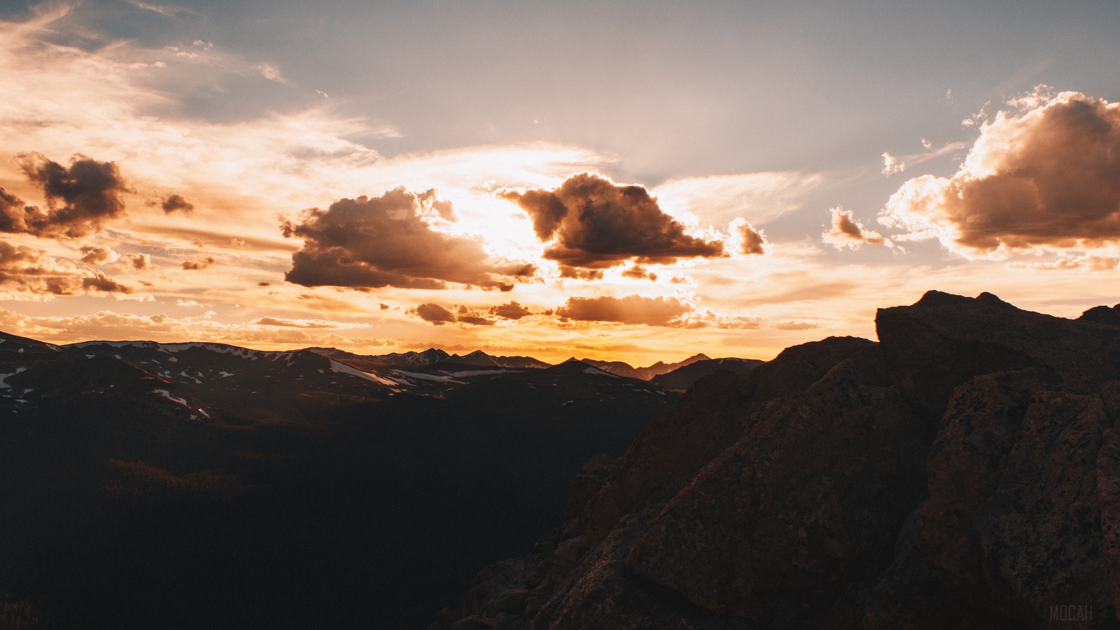Sunset over mountains with clouds 4K HD Wallpaper