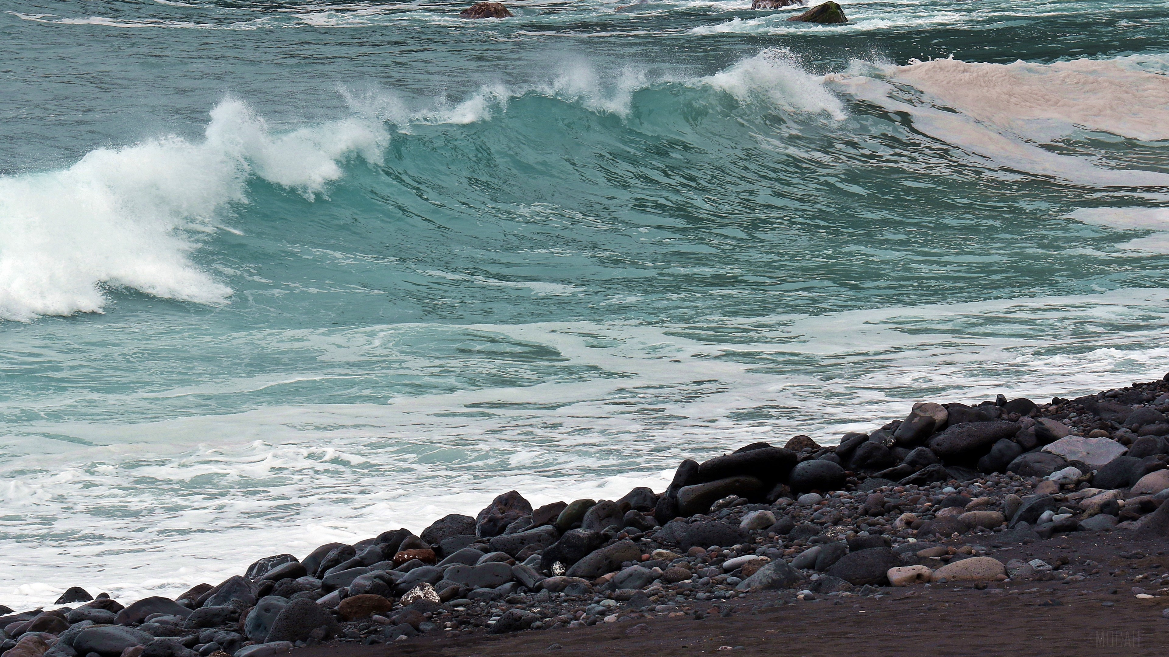 Atlantic Ocean waves crashing on a rocky beach 4K HD Wallpaper