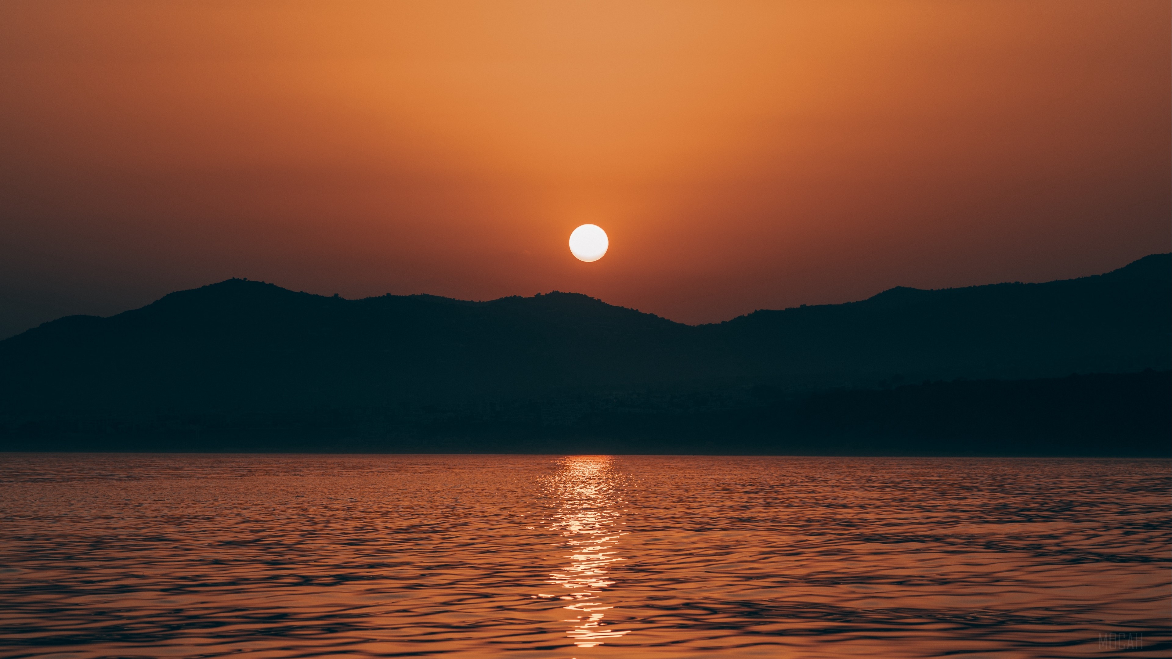 Sunset over the sea with mountains in Nerja, Spain 4K HD Wallpaper