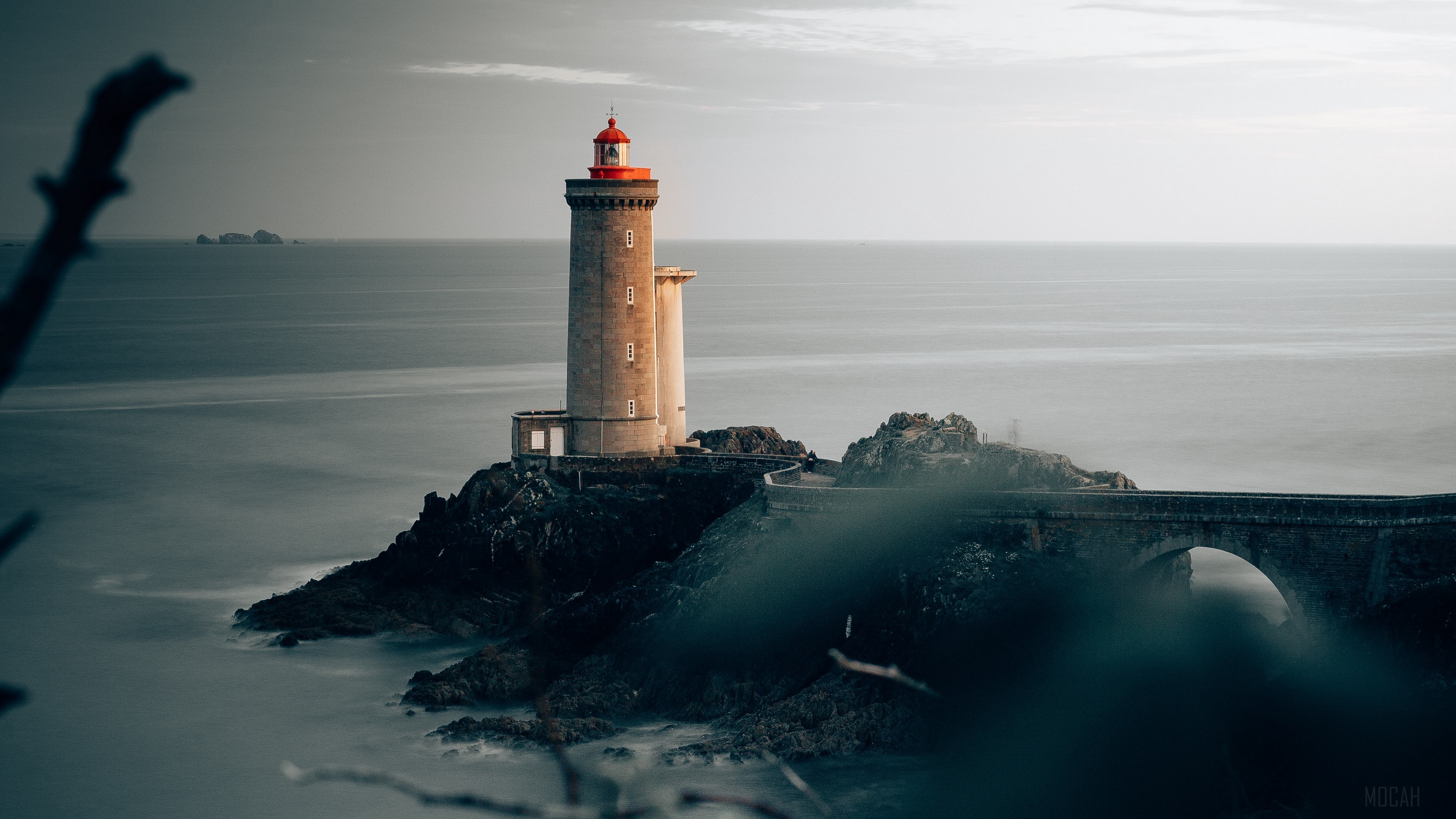 Lighthouse on a rocky island in France 4K HD Wallpaper
