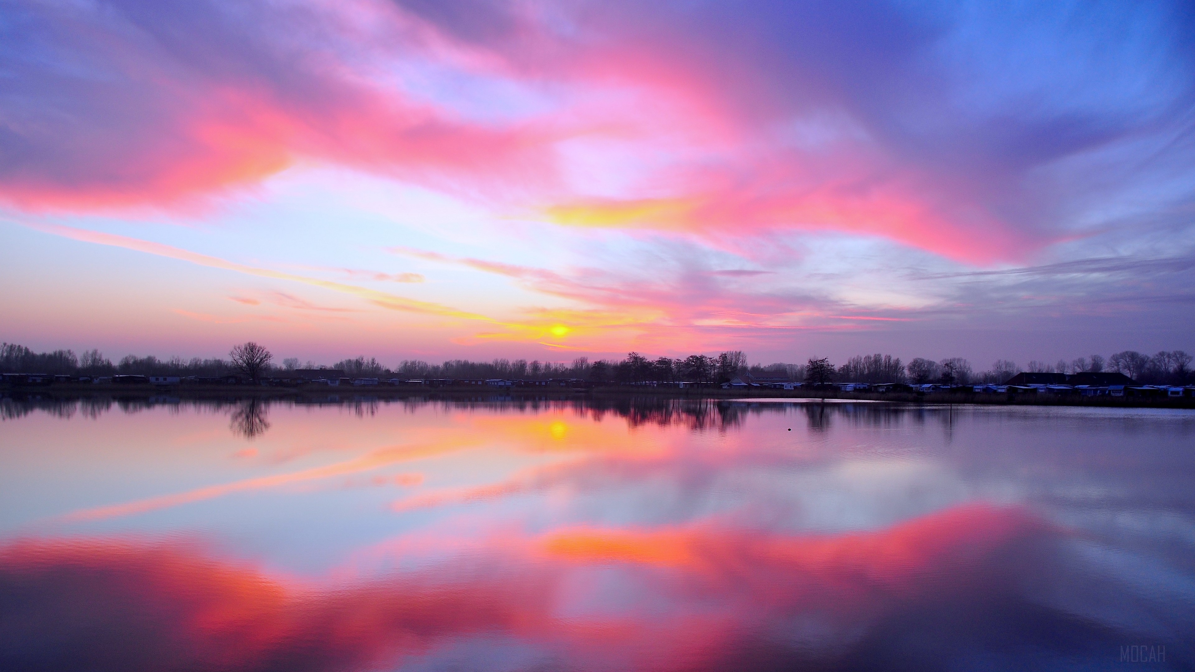 Sunset over a lake in Cuxhaven, Germany 4K HD Wallpaper