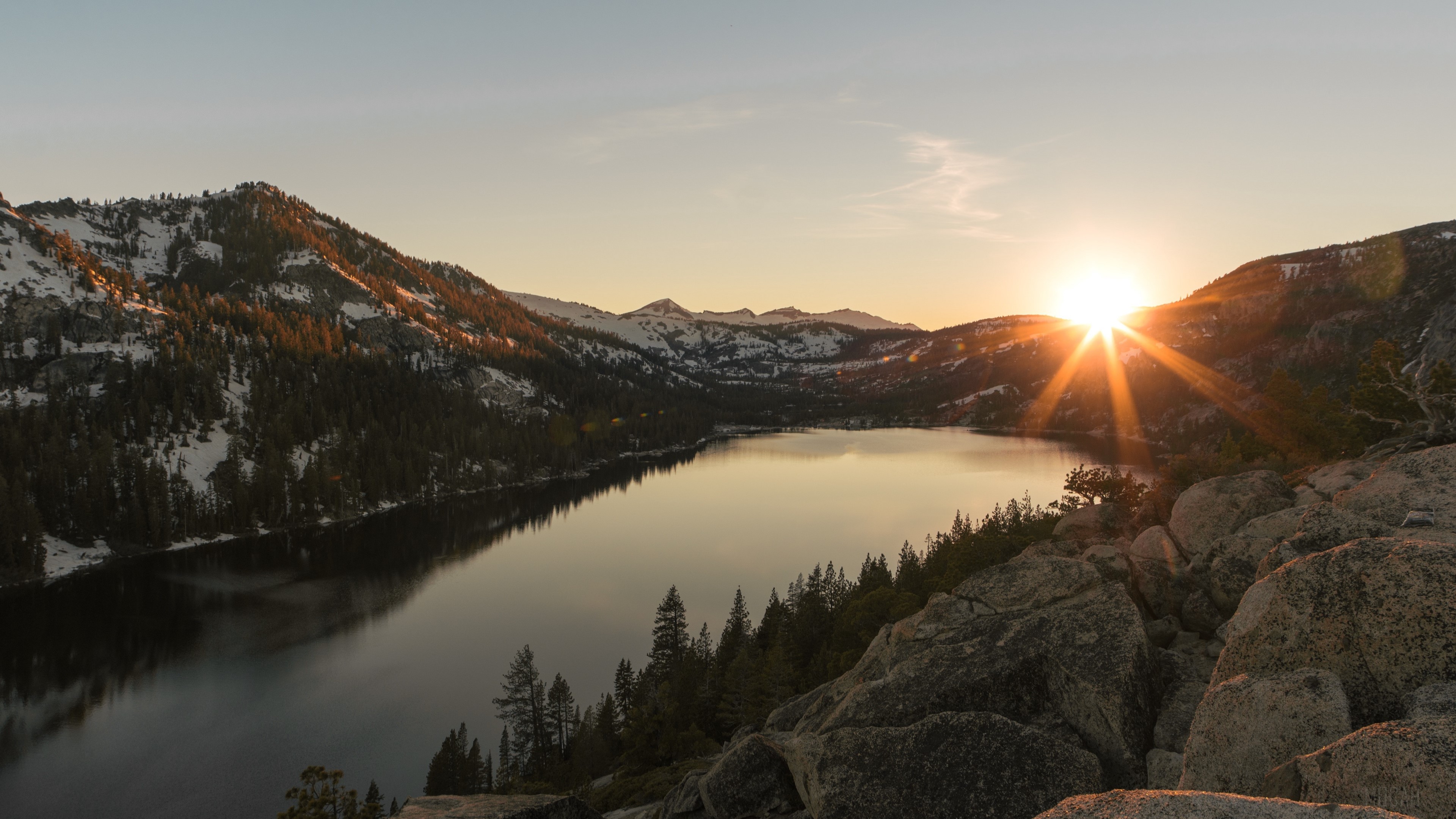 Lake and mountains at sunset with stones 4K HD Wallpaper