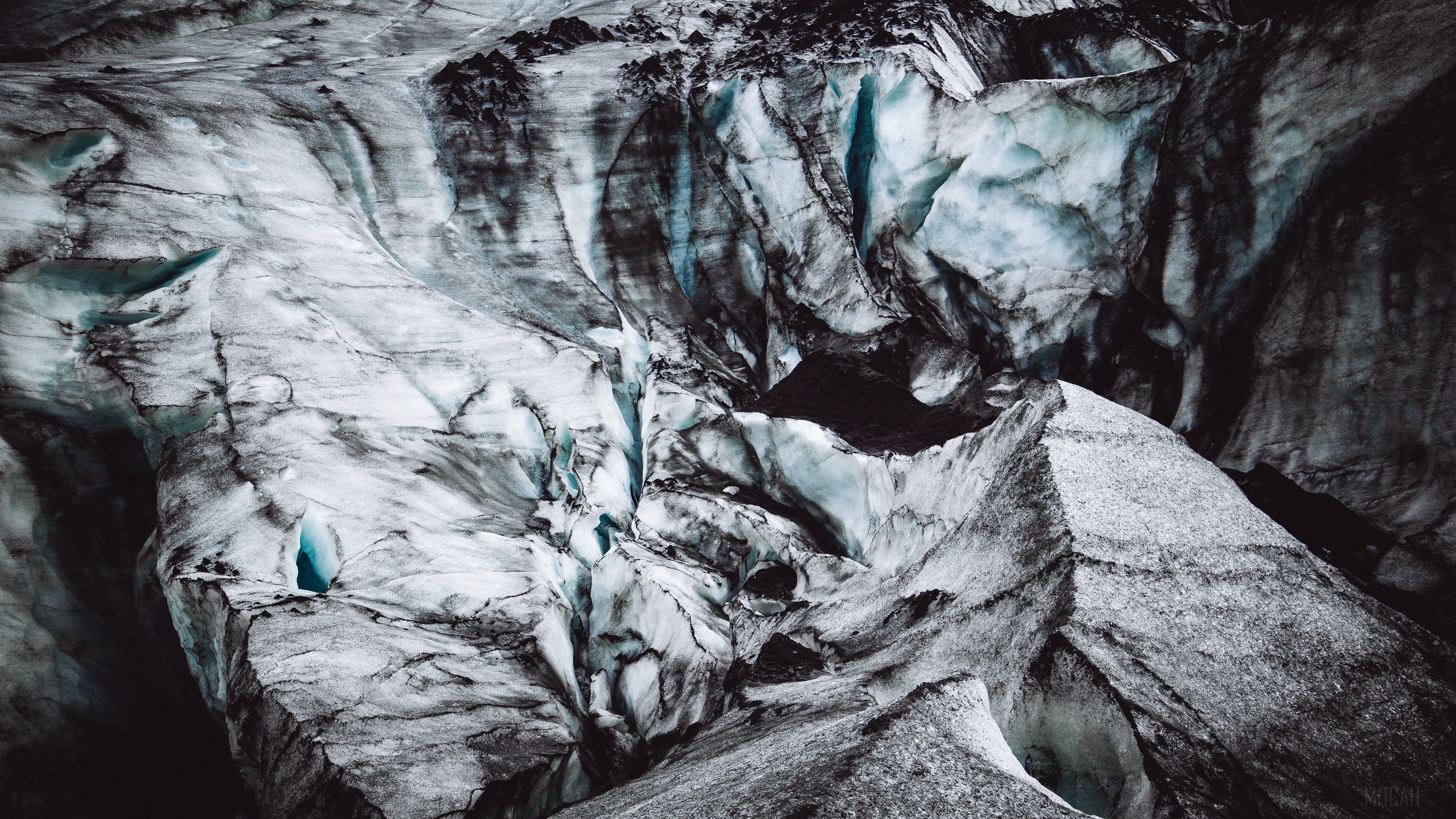Glacier surface with blue ice caves in Iceland 4K HD Wallpaper