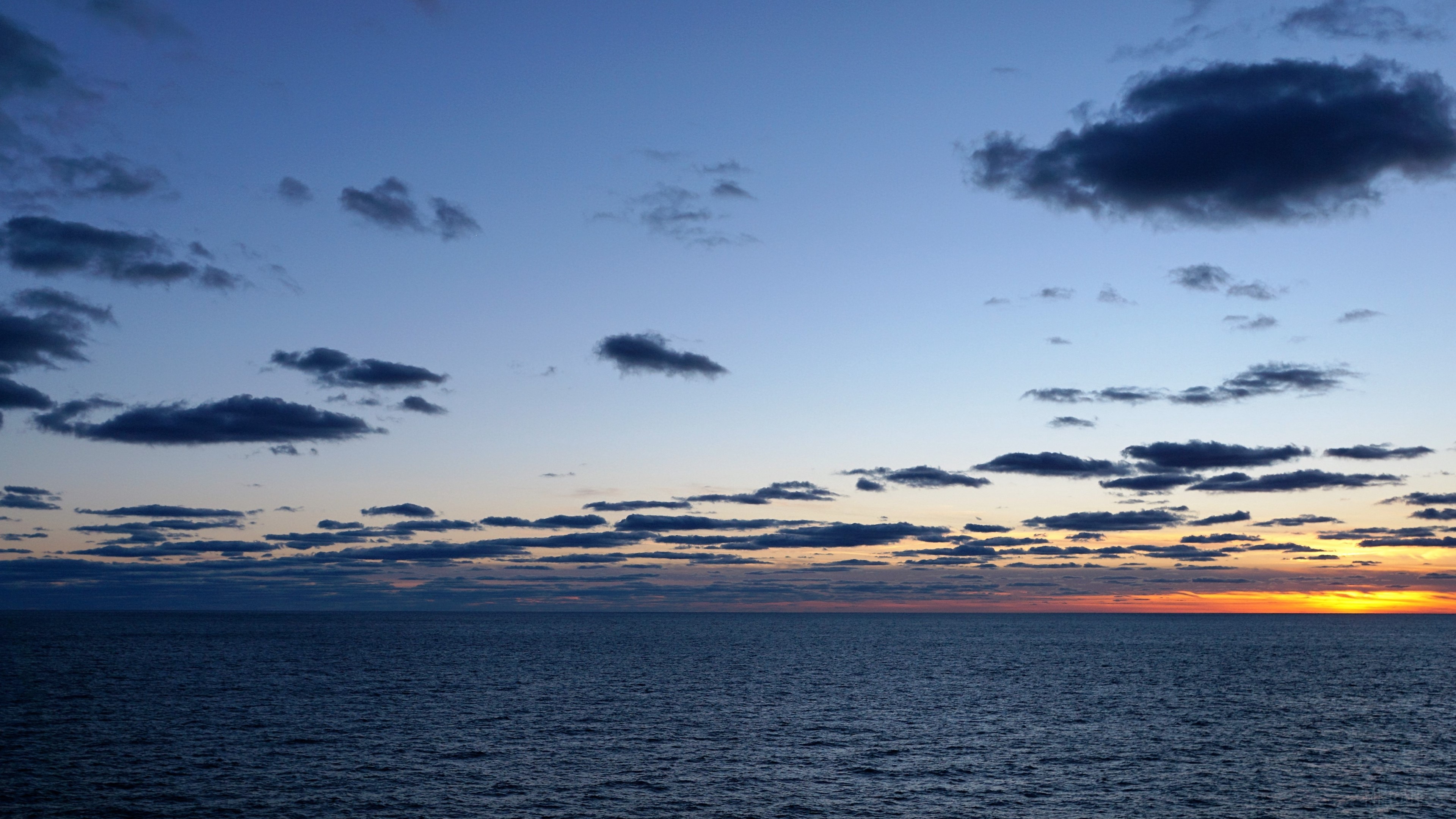 Ocean sunset with clouds 4K HD Wallpaper