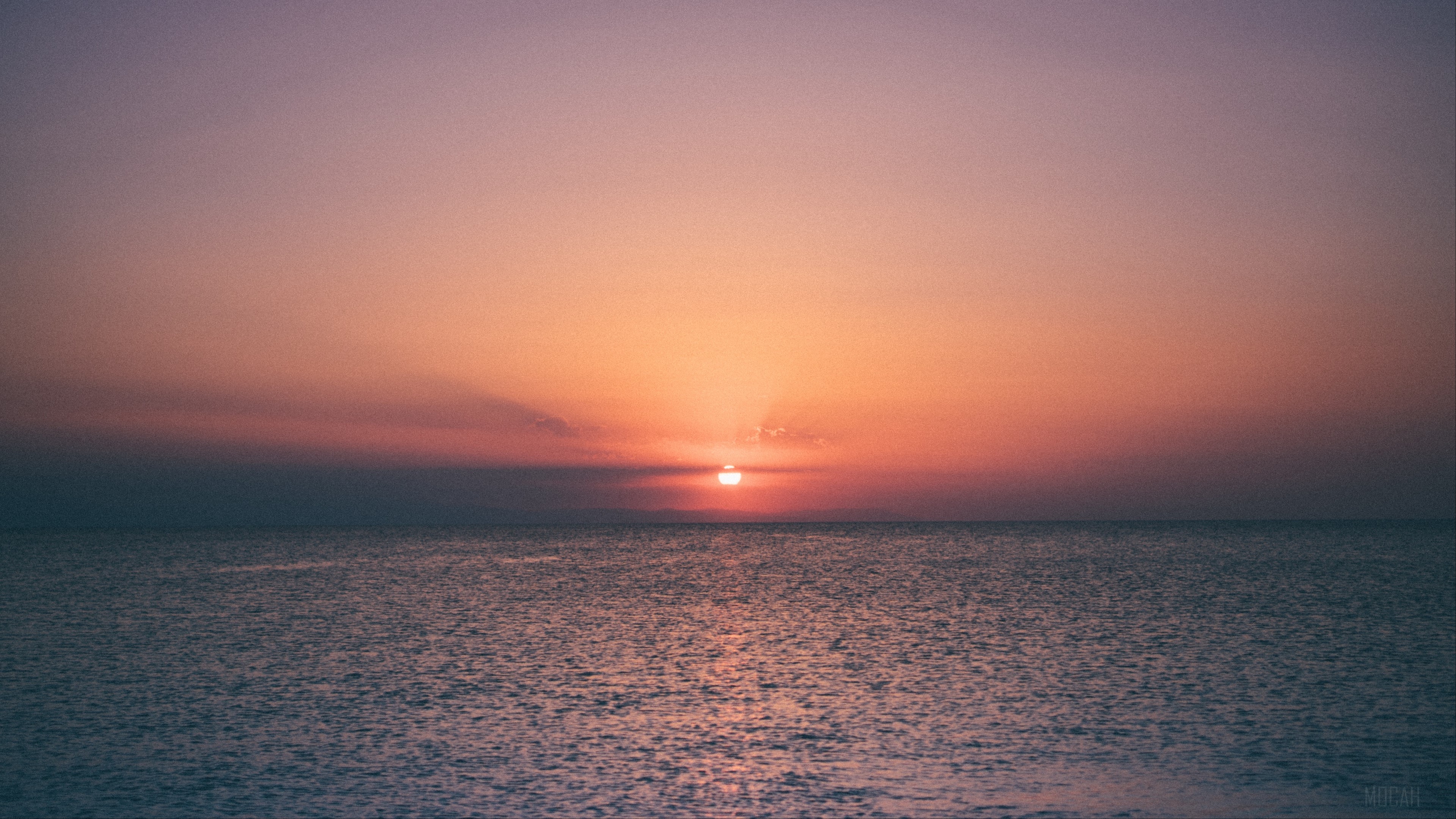Sunset over the sea 4K HD Wallpaper