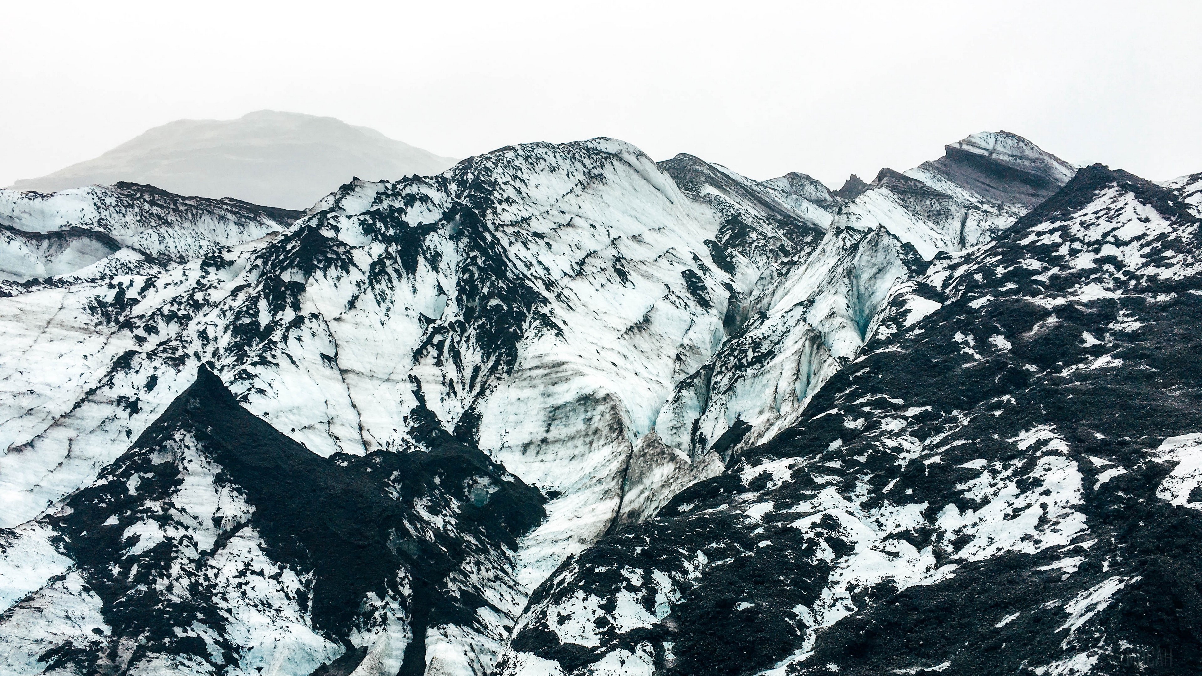 Snow-covered mountains and peaks 4K HD Wallpaper