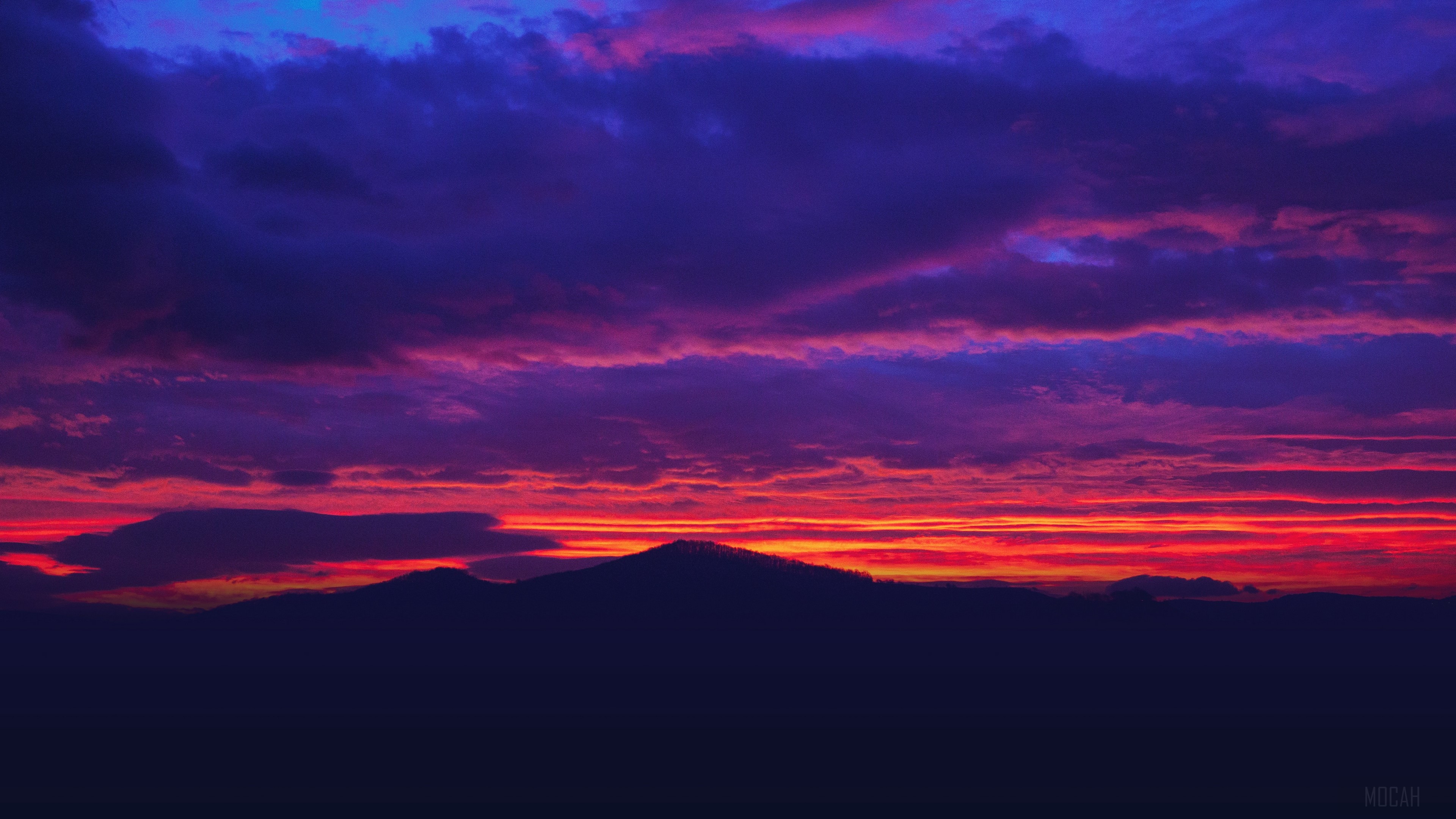 Mountains at sunset with colorful clouds 4K HD Wallpaper