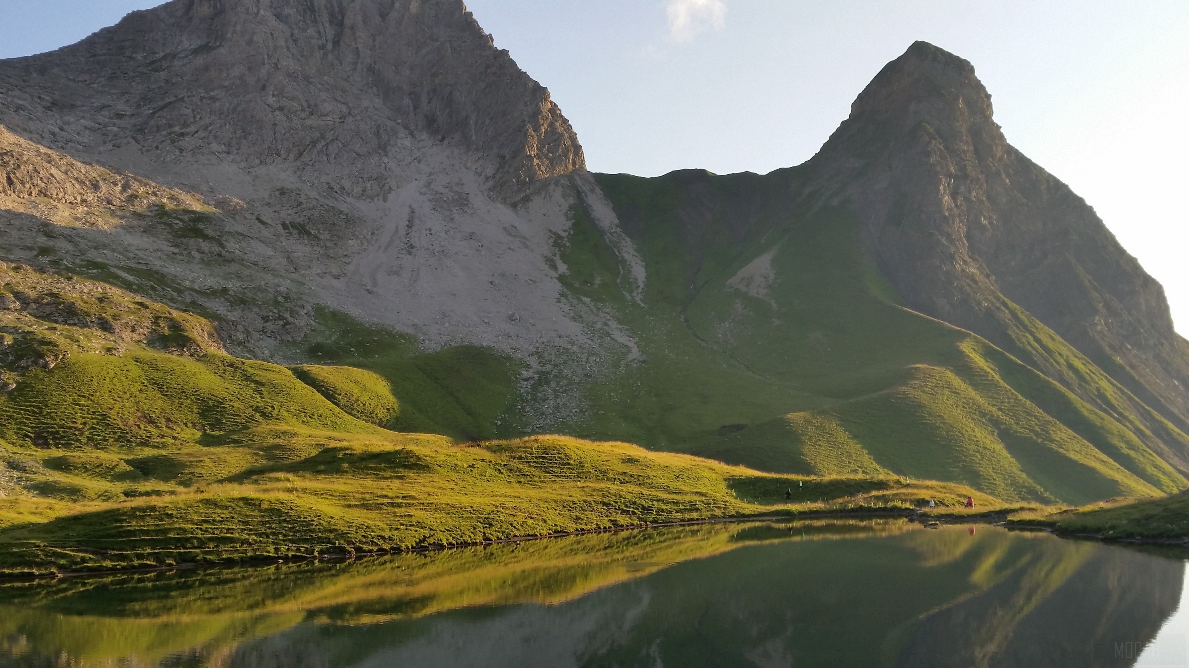 Mountain lake with grass reflection 4K HD Wallpaper
