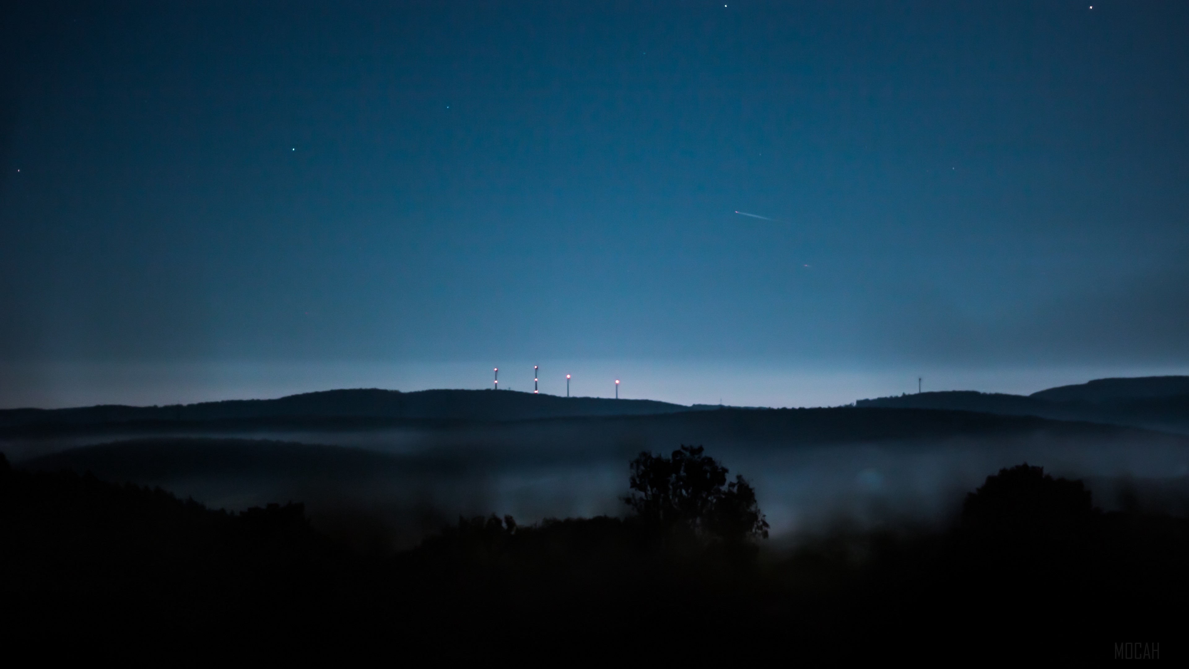 Night landscape with fog and wind turbines HD Wallpaper