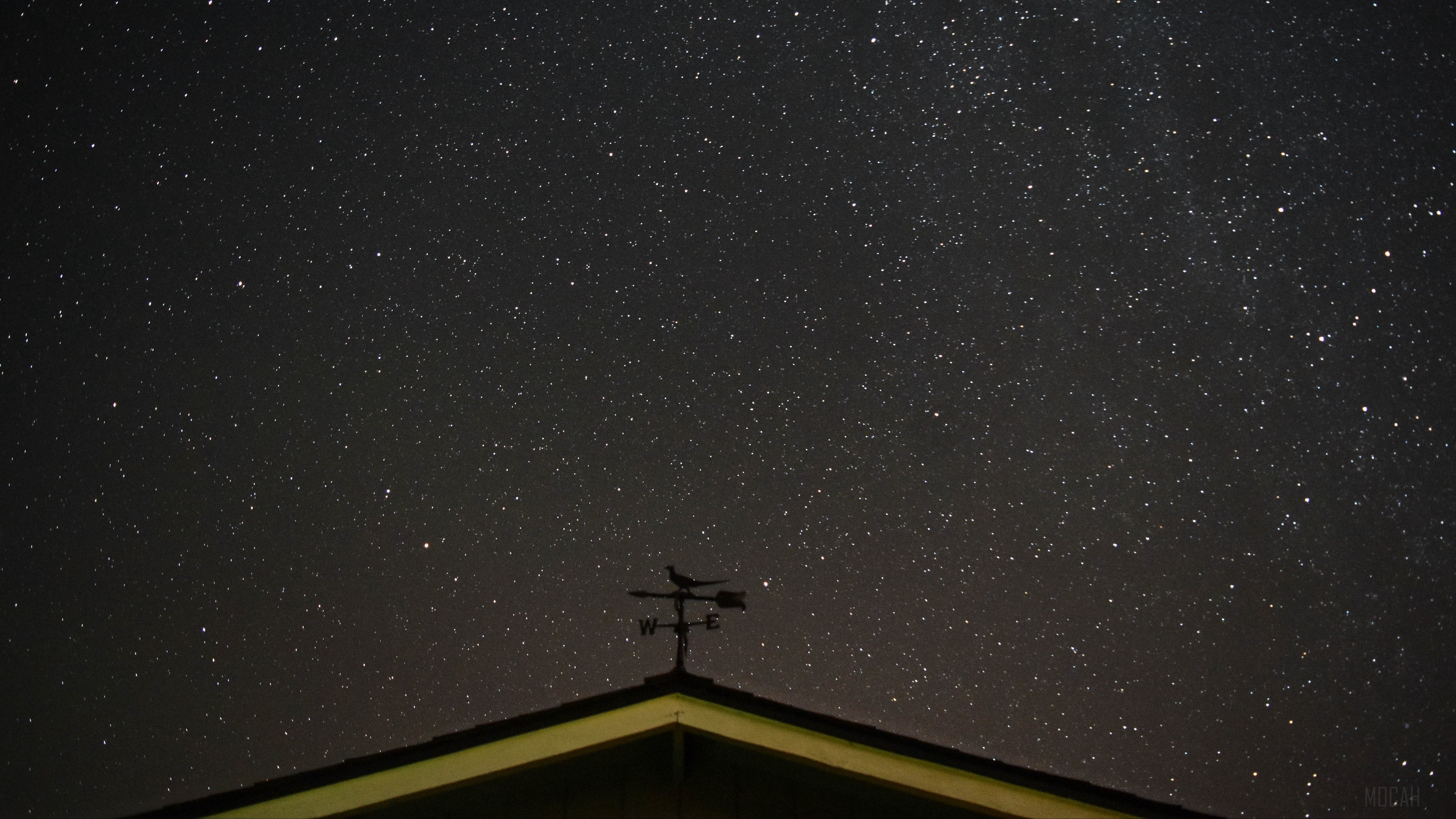 Starry sky above a roof with a weather vane HD Wallpaper