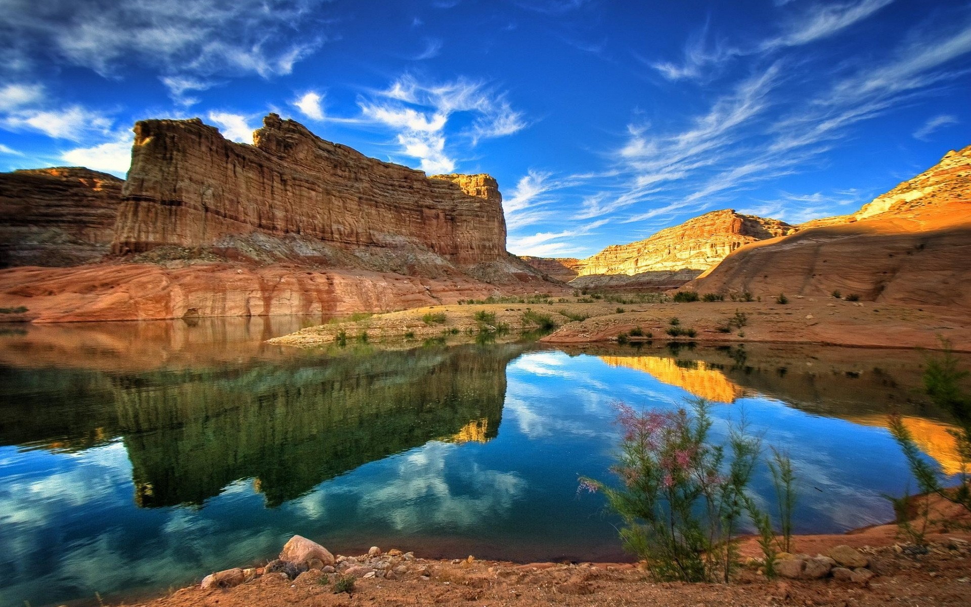 Desert canyon with a lake and rock formations HD Wallpaper