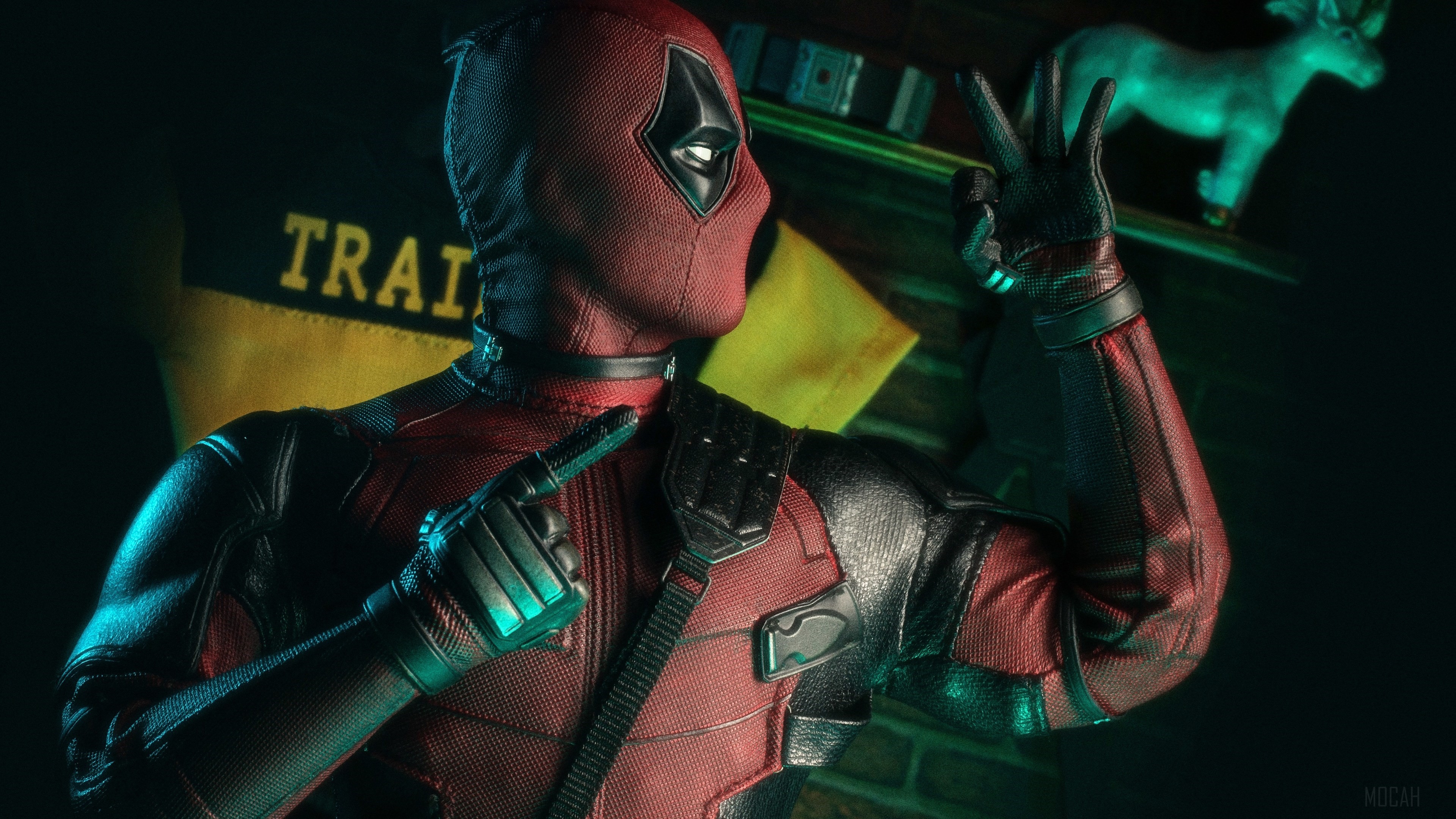 Deadpool from Marvel Comics making peace sign HD Wallpaper