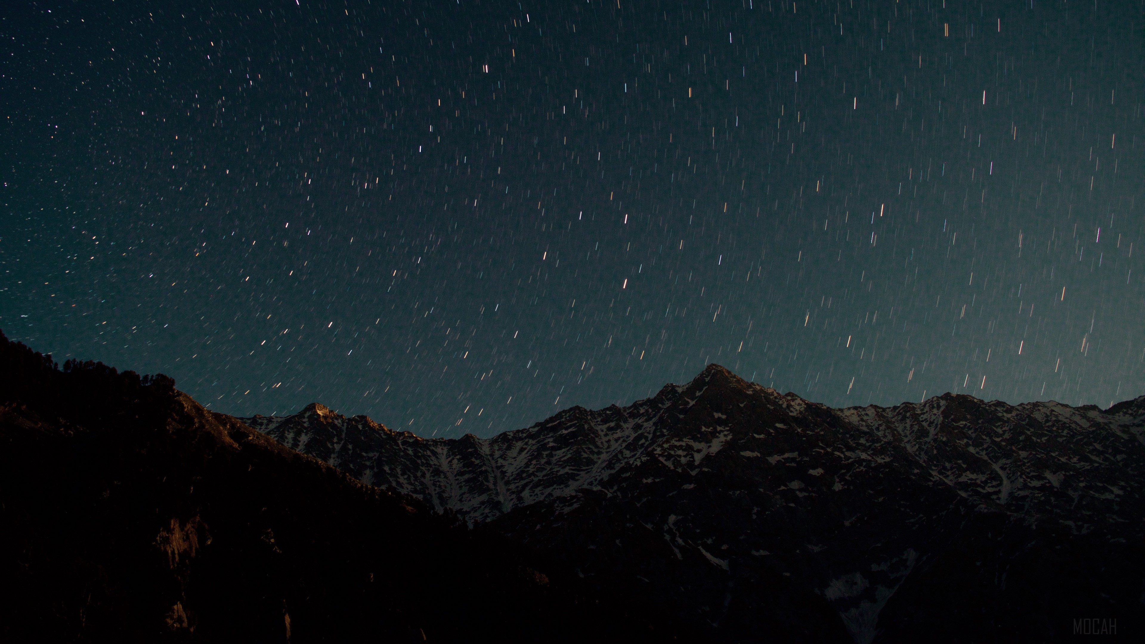 Starry night sky over snow-capped mountains HD Wallpaper