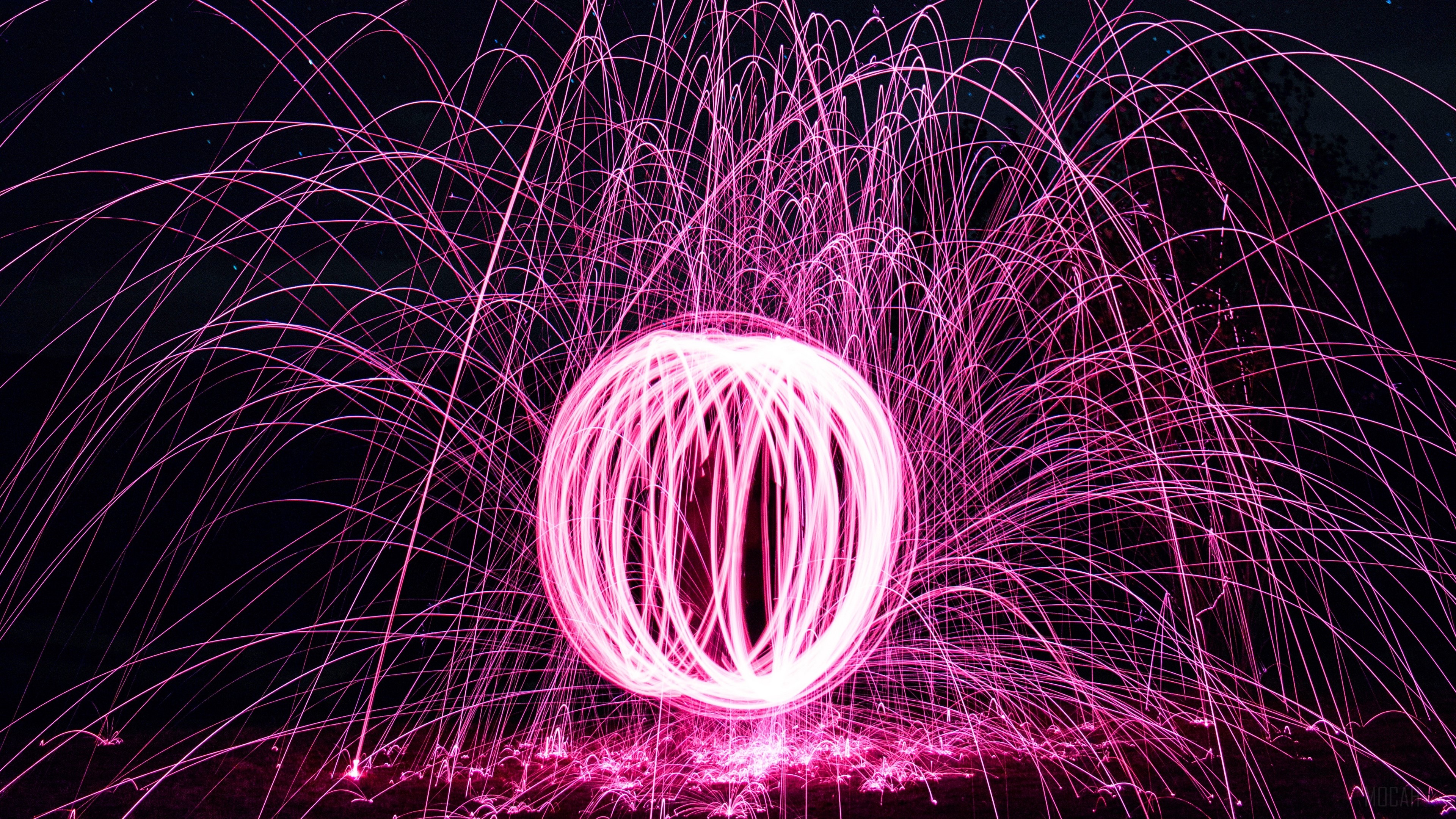 Light art ball with pink rays and glitter 4K HD Wallpaper