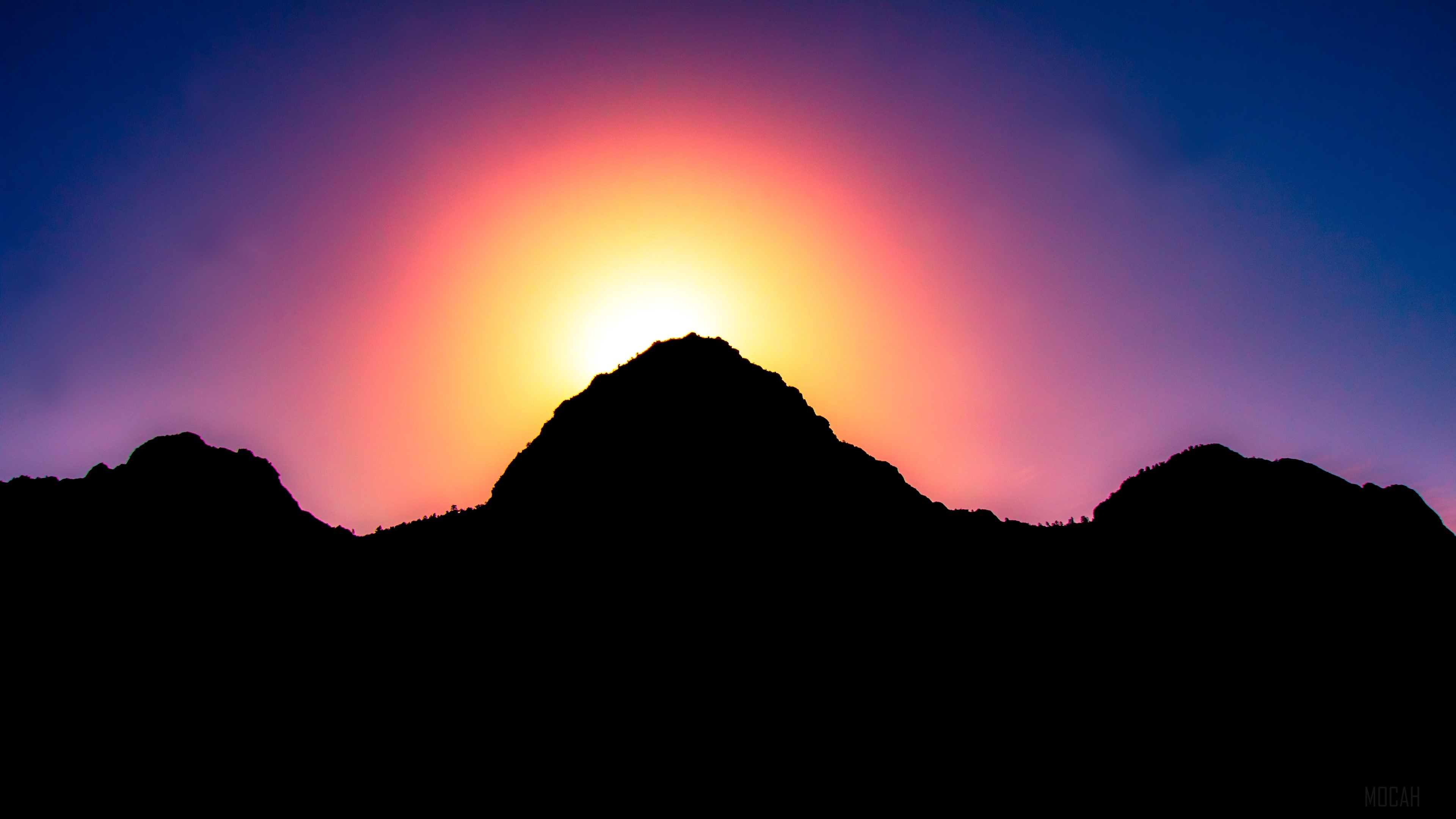 Silhouette of mountains at sunset with colorful sky 4K HD Wallpaper