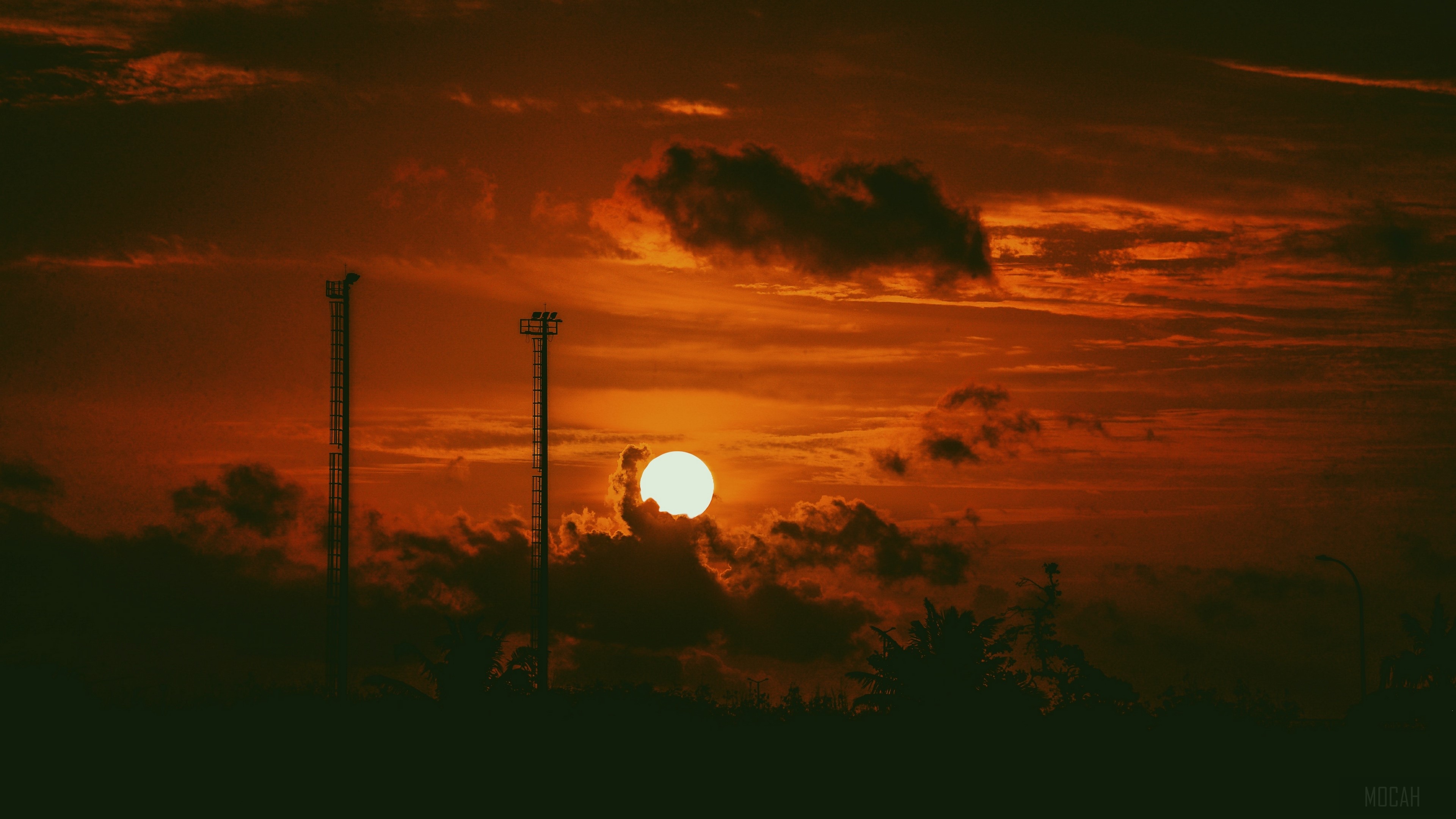 Sunset with towers and clouds 4K HD Wallpaper
